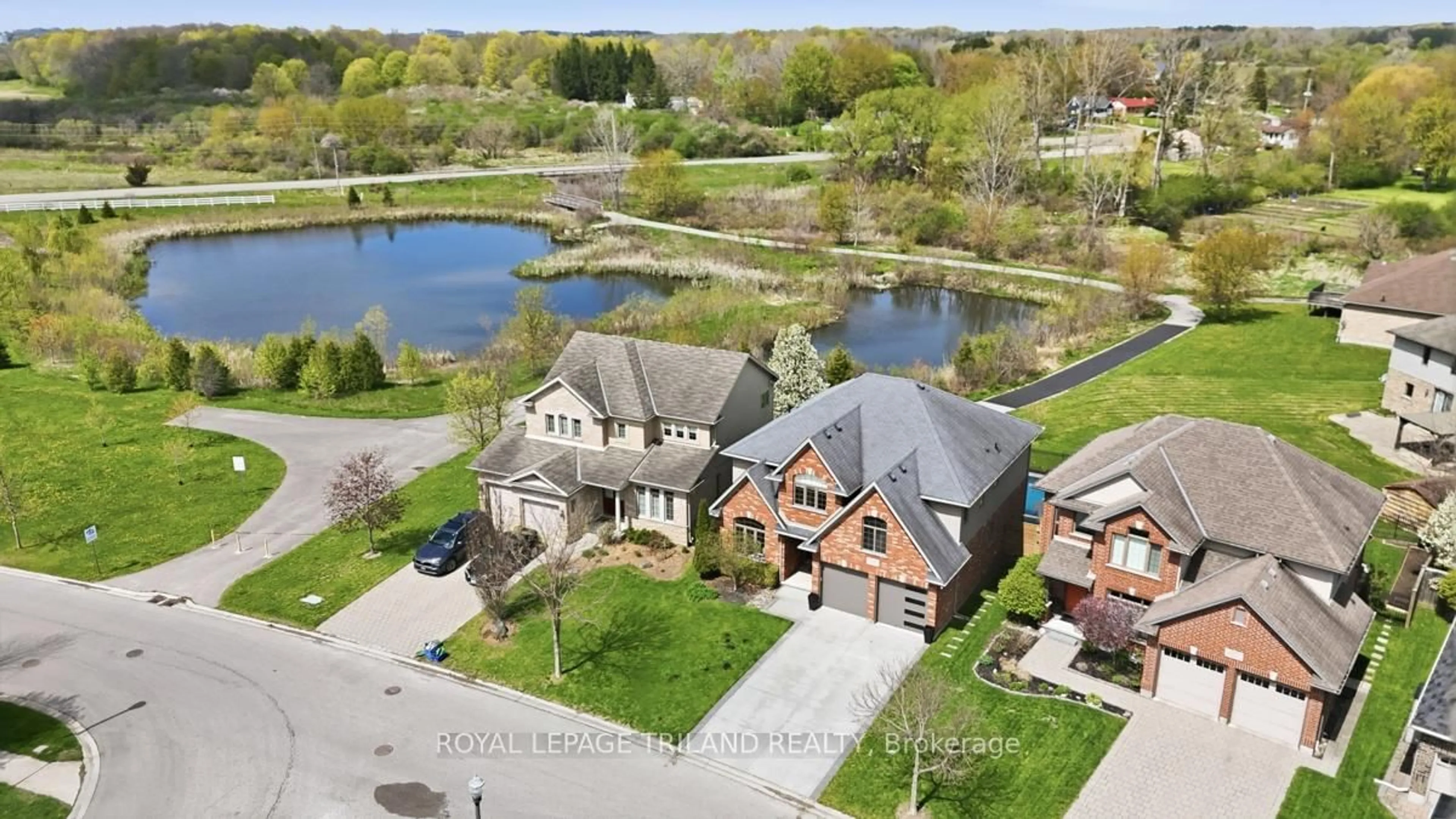 A pic from outside/outdoor area/front of a property/back of a property/a pic from drone, water/lake/river/ocean view for 2091 Pennyroyal St, London North Ontario N5X 0E6