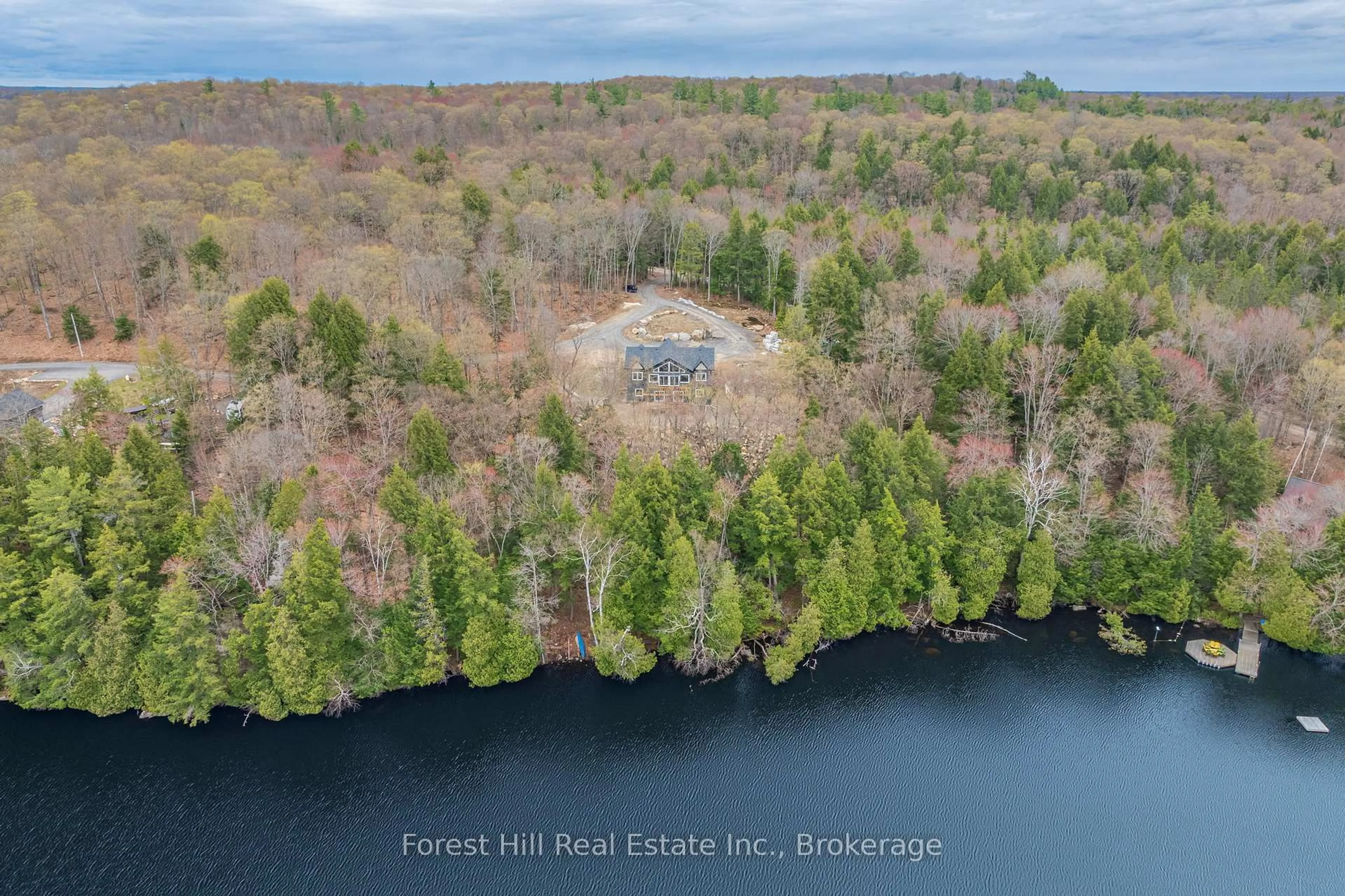 A pic from outside/outdoor area/front of a property/back of a property/a pic from drone, water/lake/river/ocean view for 1-1269 S Ril Lake Rd, Lake of Bays Ontario P0B 1A0