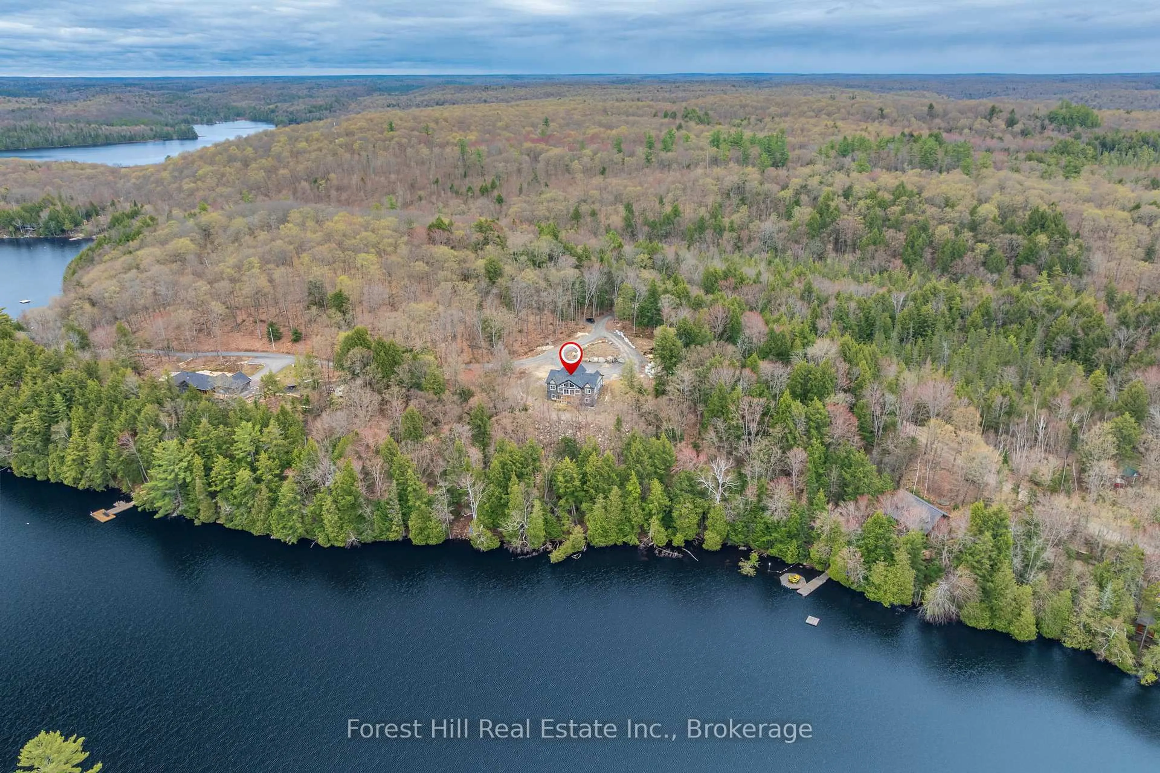 A pic from outside/outdoor area/front of a property/back of a property/a pic from drone, water/lake/river/ocean view for 1-1269 S Ril Lake Rd, Lake of Bays Ontario P0B 1A0