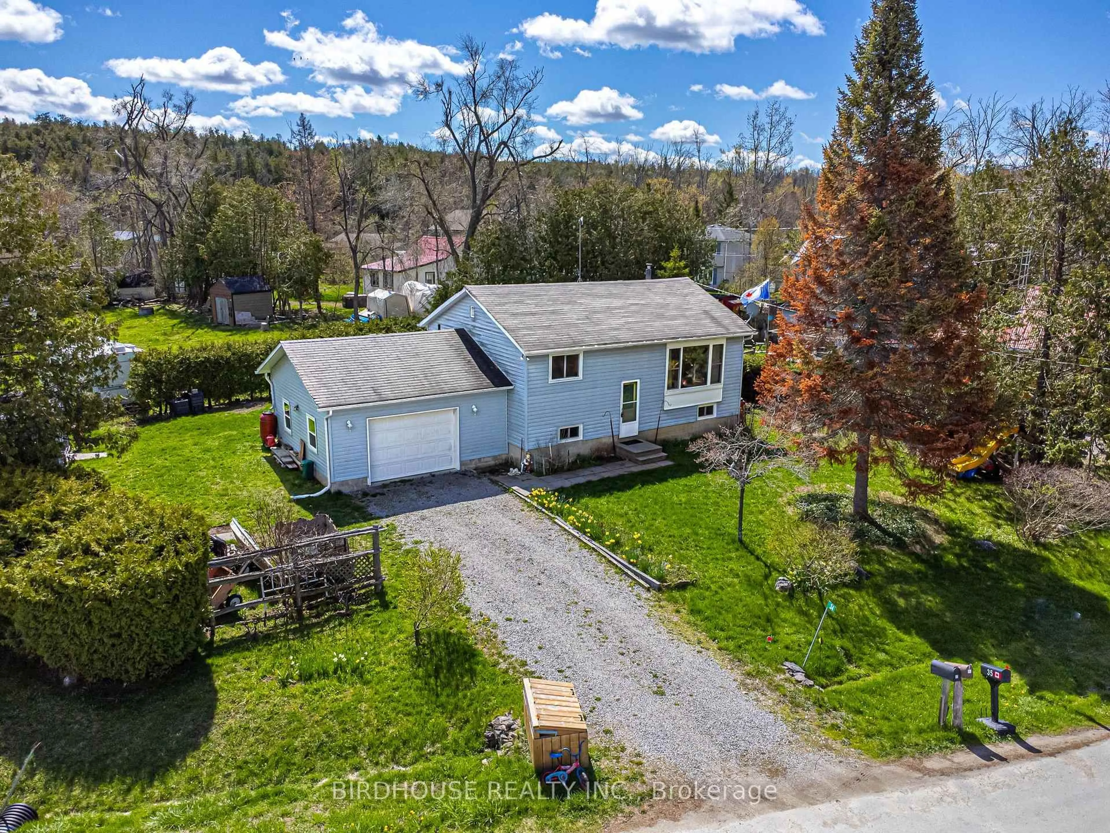 A pic from outside/outdoor area/front of a property/back of a property/a pic from drone, street for 34 Elder St, Kawartha Lakes Ontario K0M 1L0