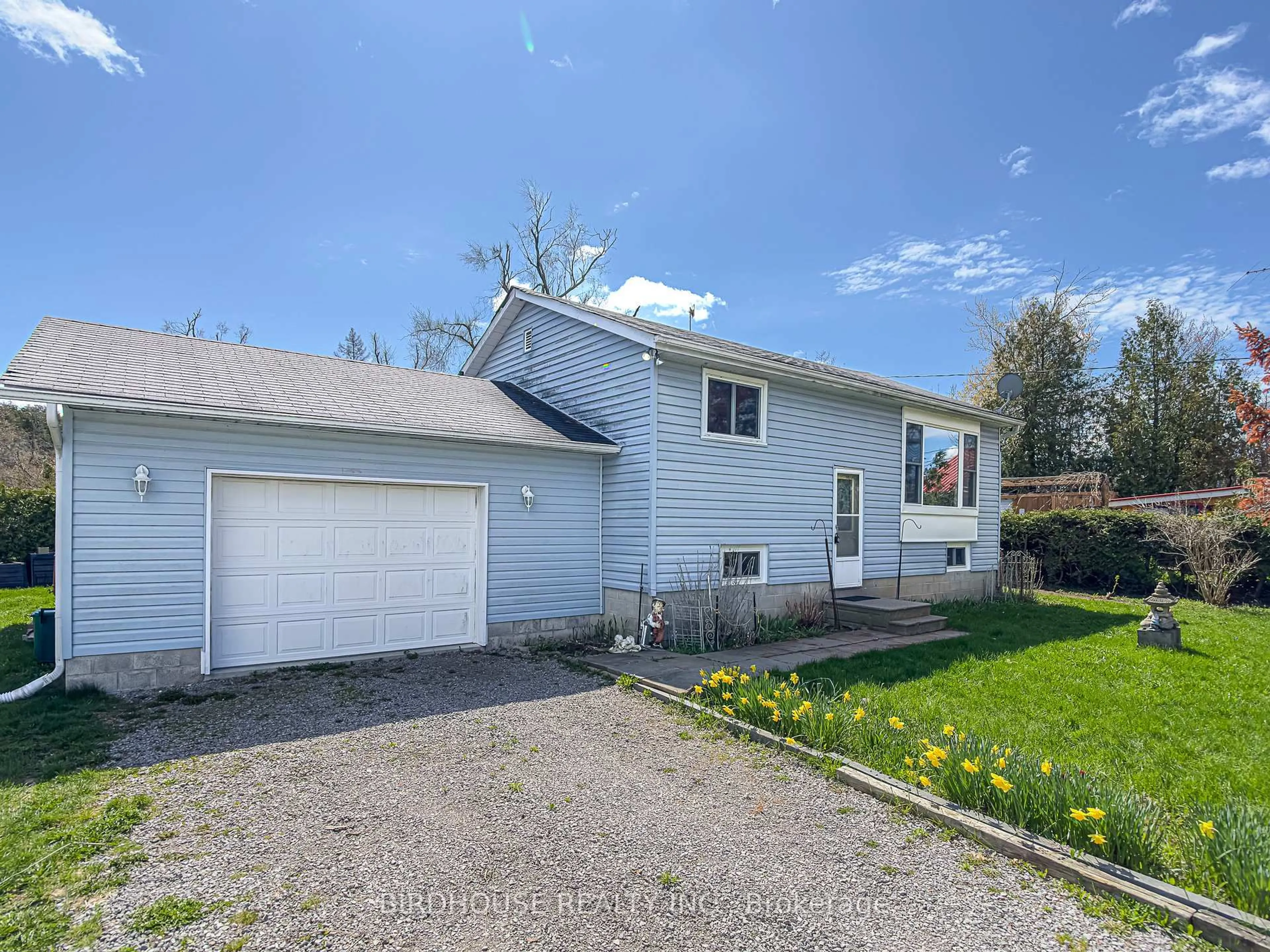 Home with vinyl exterior material, street for 34 Elder St, Kawartha Lakes Ontario K0M 1L0