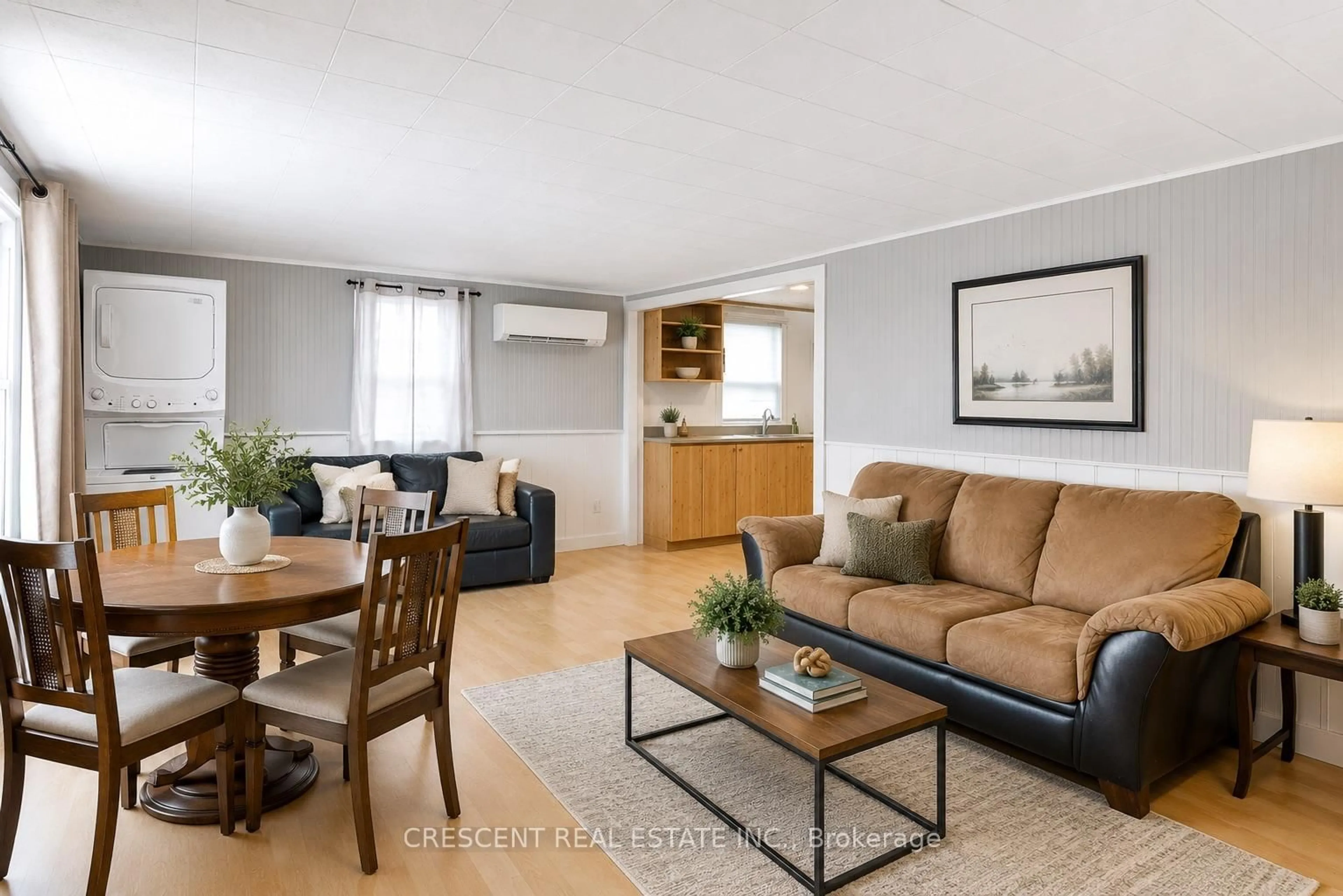 Living room with furniture, wood/laminate floor for 241 Avery Point Rd, Kawartha Lakes Ontario L0K 1W0