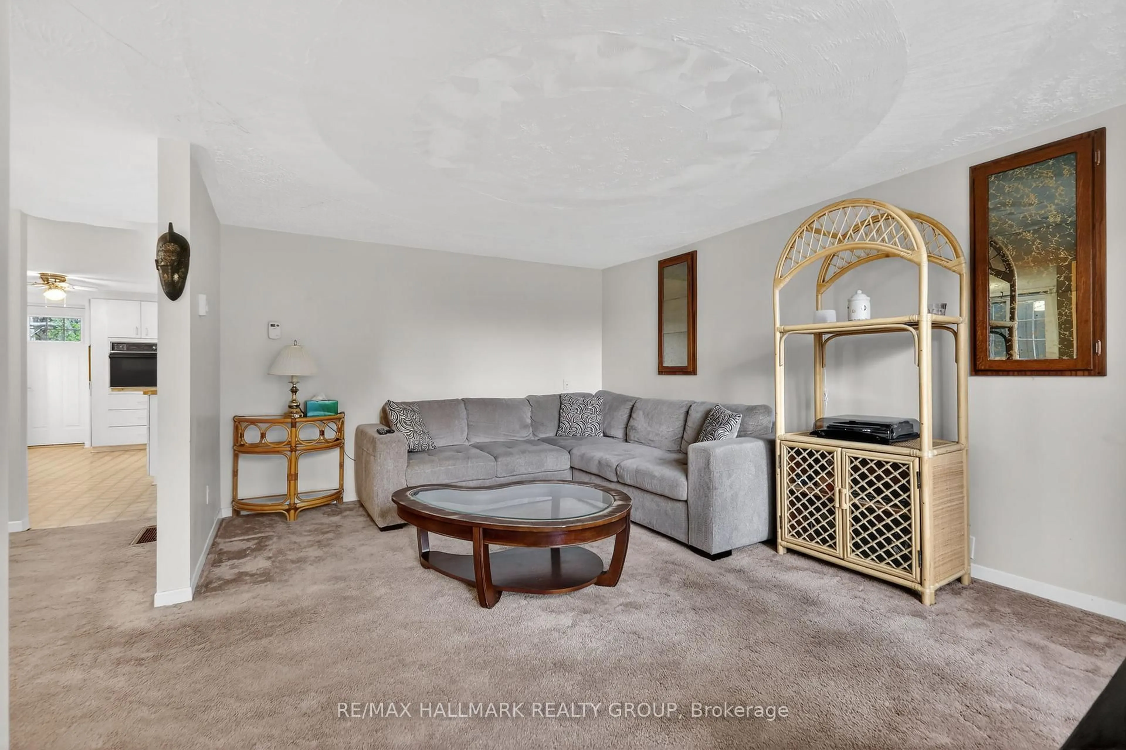 Living room with furniture, carpet floor for 30 Findlay St, Braeside Ontario K0A 1G0