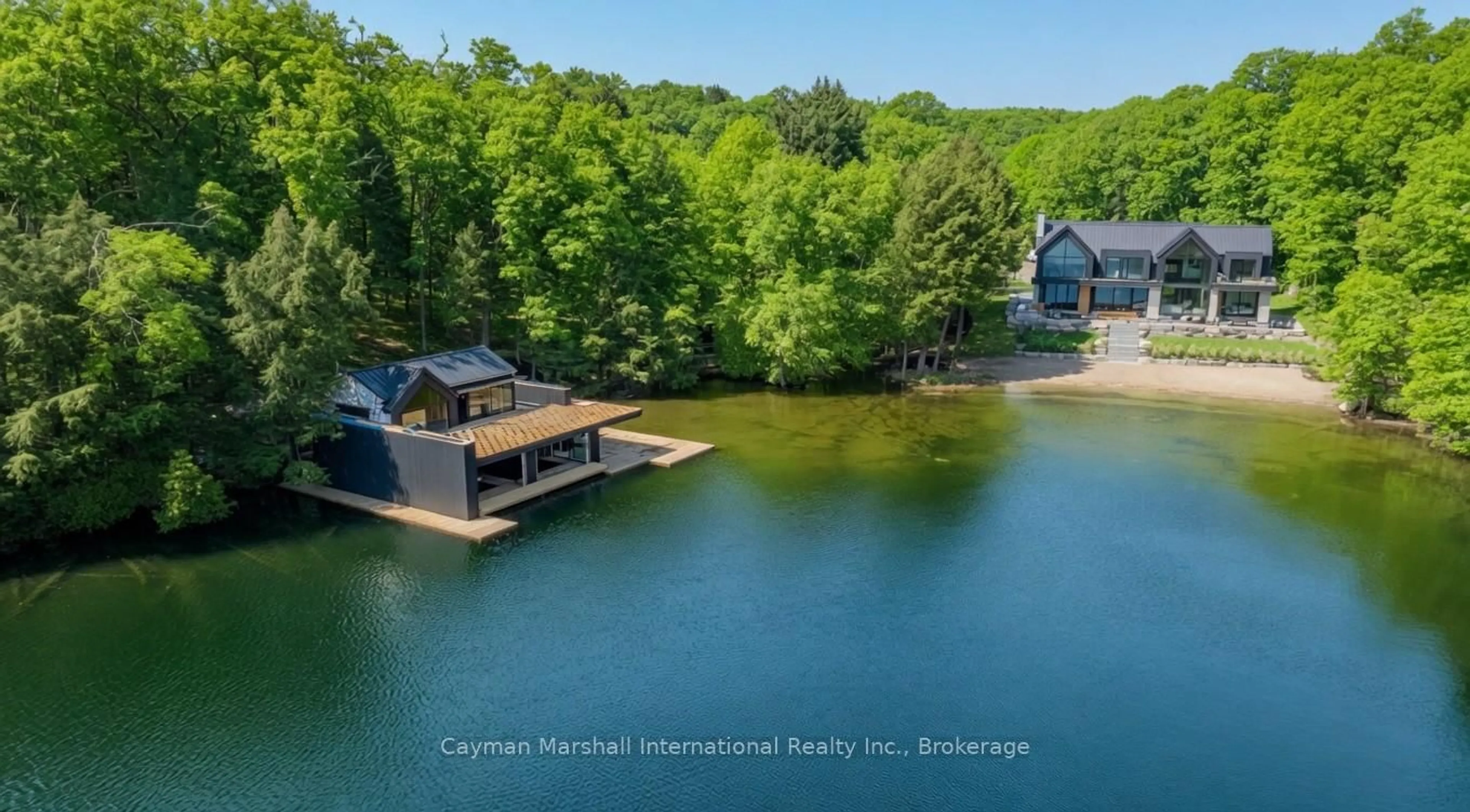 A pic from outside/outdoor area/front of a property/back of a property/a pic from drone, water/lake/river/ocean view for 1002 Murphy Rd, Muskoka Lakes Ontario P0C 1H0
