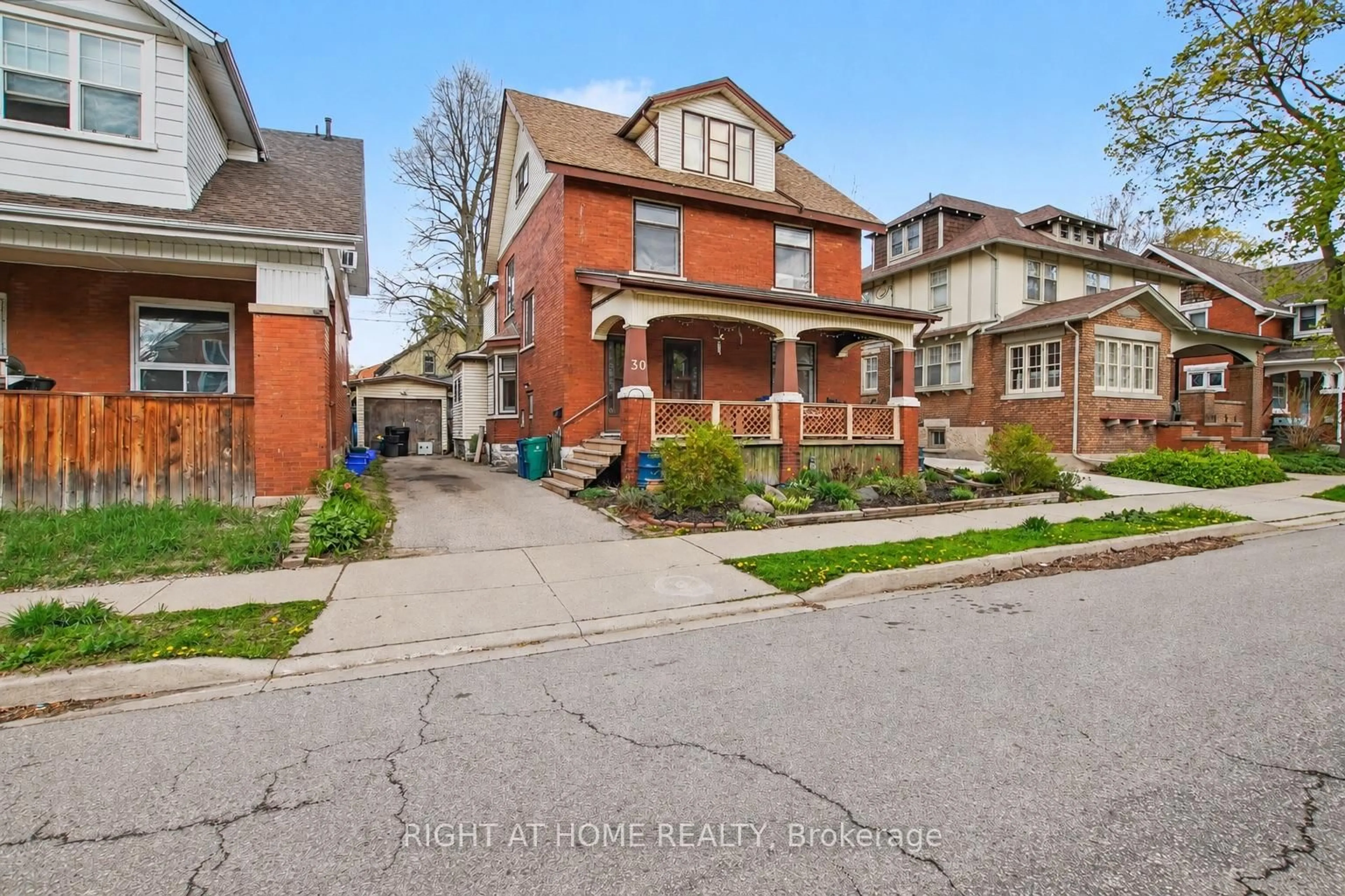 Home with brick exterior material, street for 30 Hohner Ave, Kitchener Ontario N2H 2V4