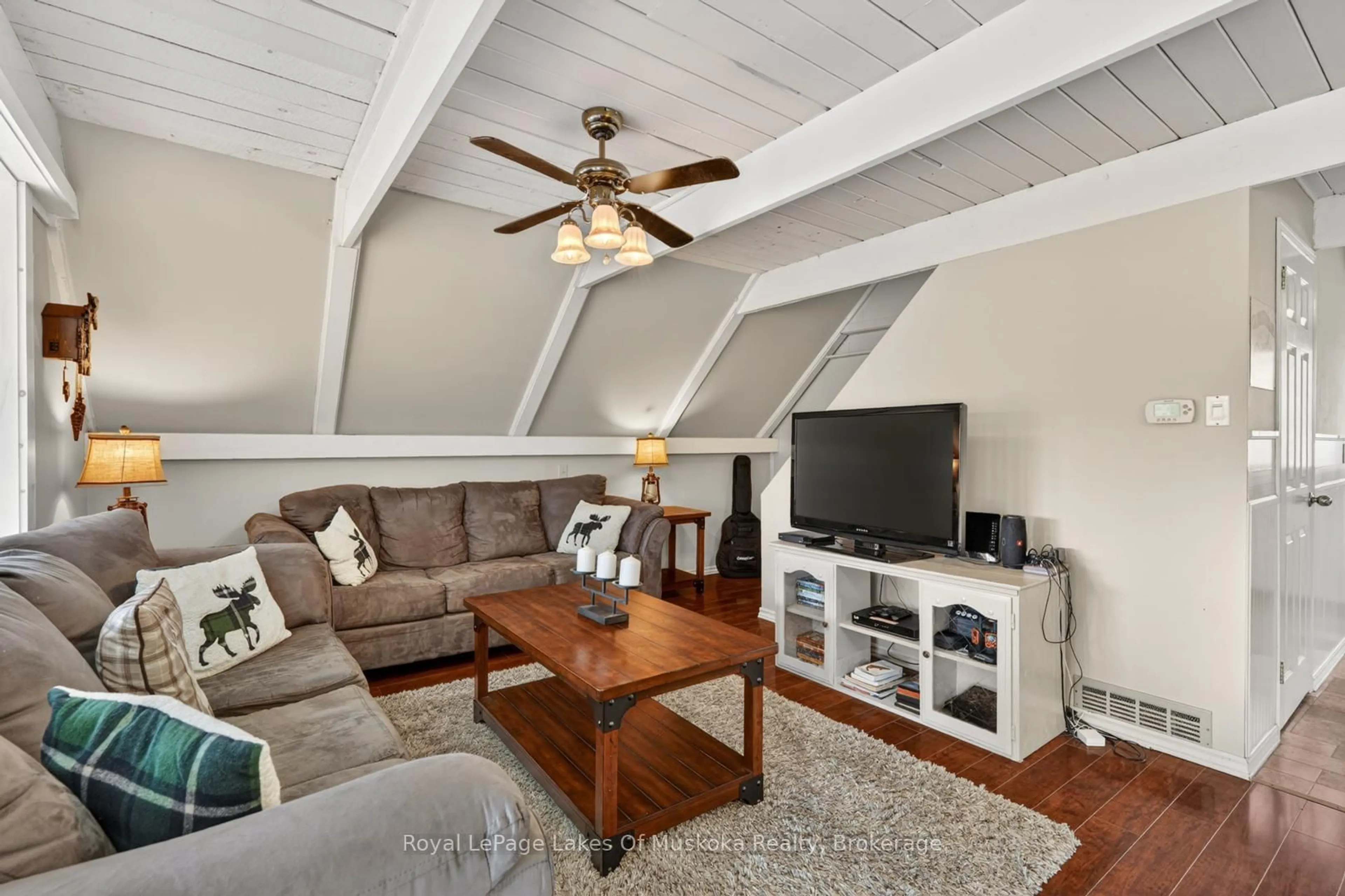 Living room with furniture, wood/laminate floor for 985 Katrine Rd, Armour Ontario P0A 1C0