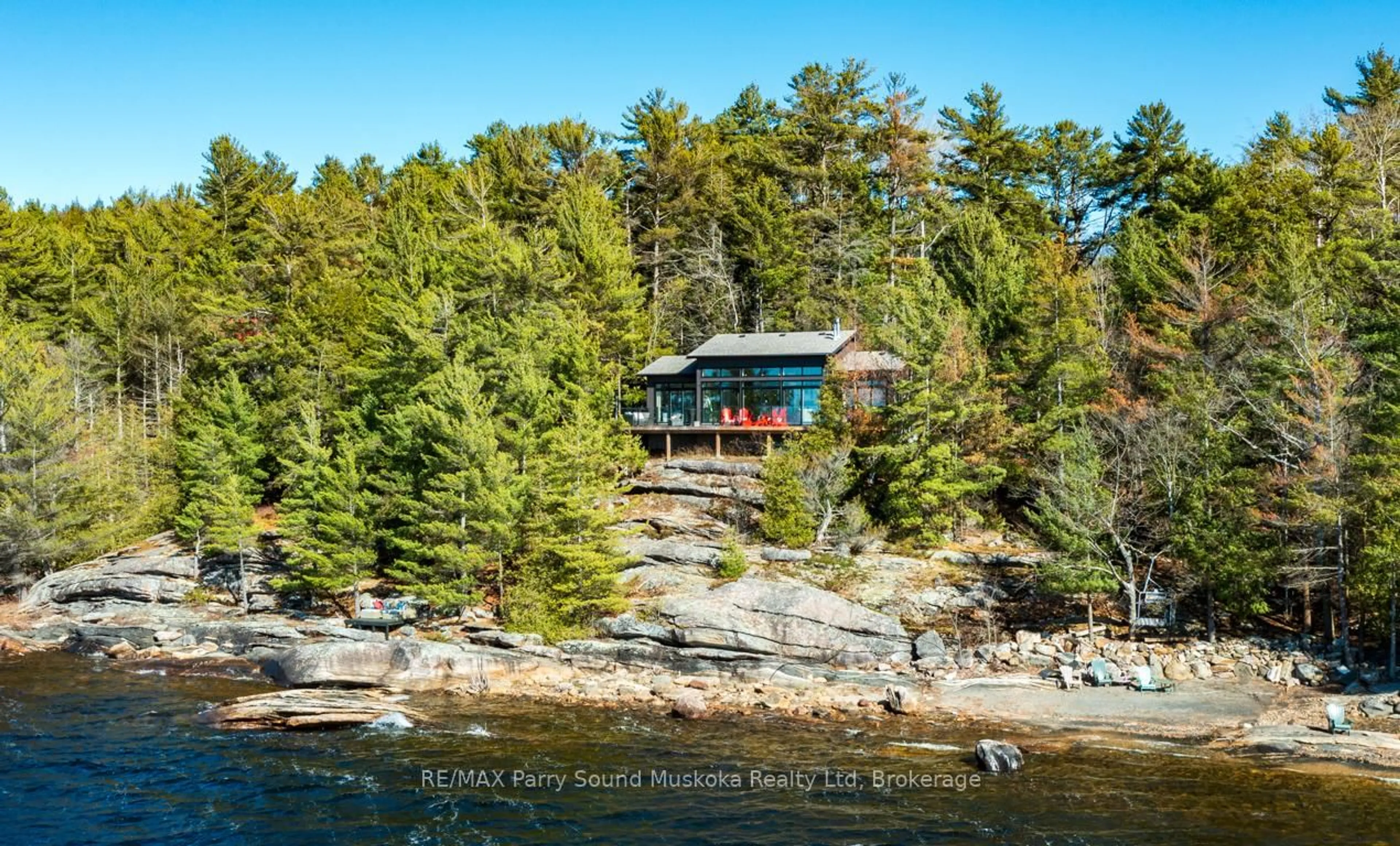 A pic from outside/outdoor area/front of a property/back of a property/a pic from drone, water/lake/river/ocean view for 1201 Geewadin Rd, Parry Sound Ontario P2A 2X2