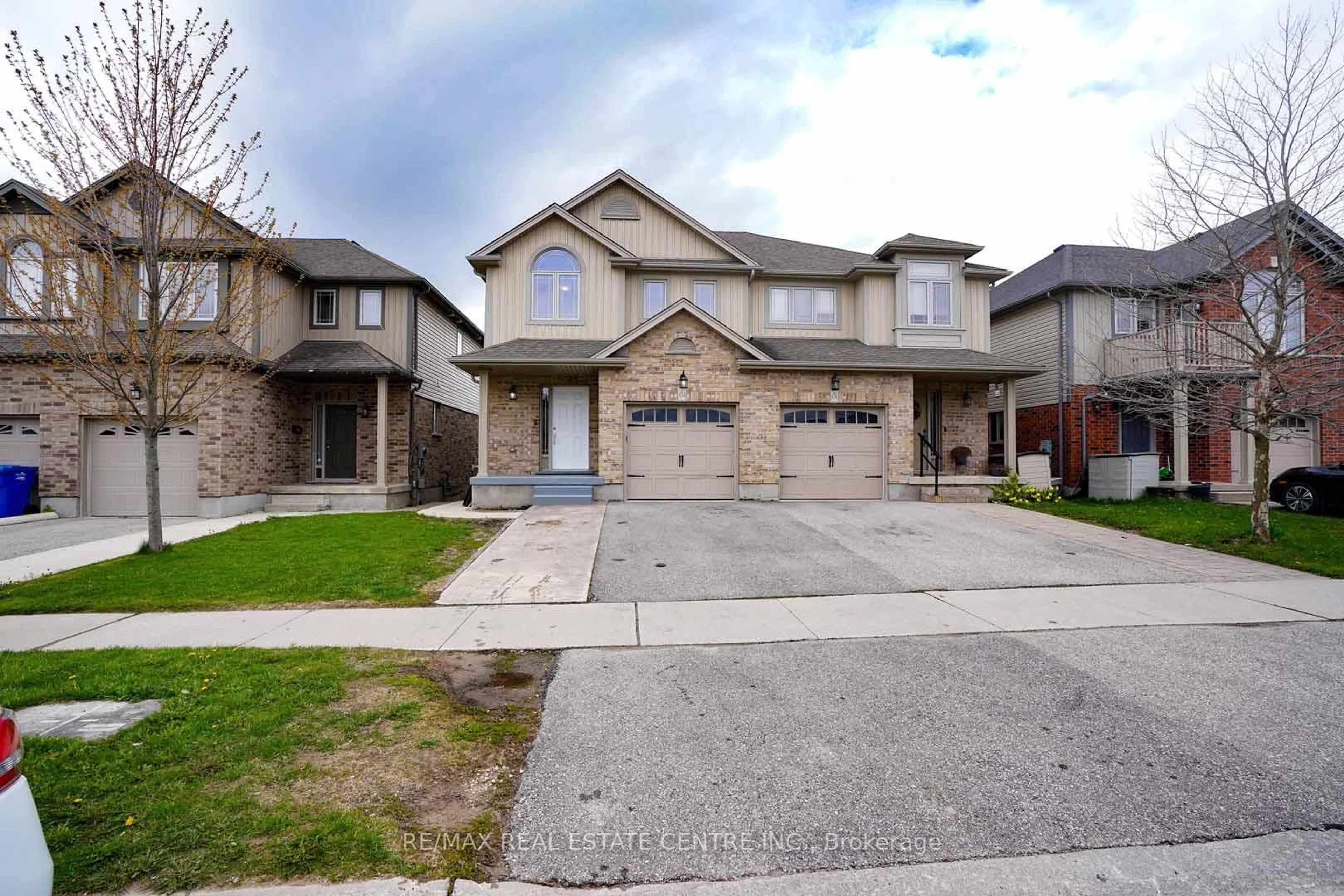 Home with brick exterior material, street for 454 Starwood Dr, Guelph Ontario N1E 0H8
