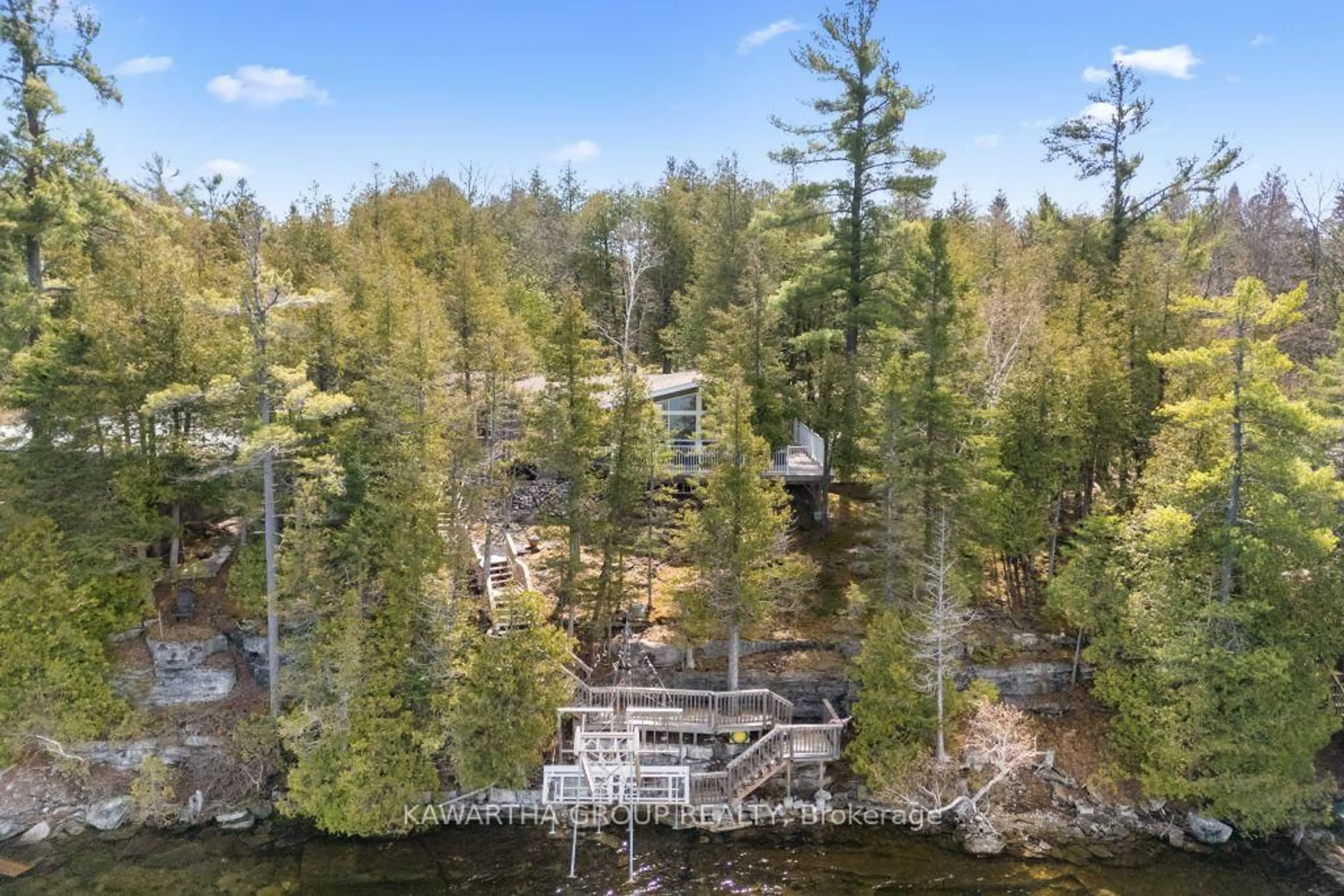 A pic from outside/outdoor area/front of a property/back of a property/a pic from drone, water/lake/river/ocean view for 43 Holy Bay Dr, Kawartha Lakes Ontario K0M 1K0