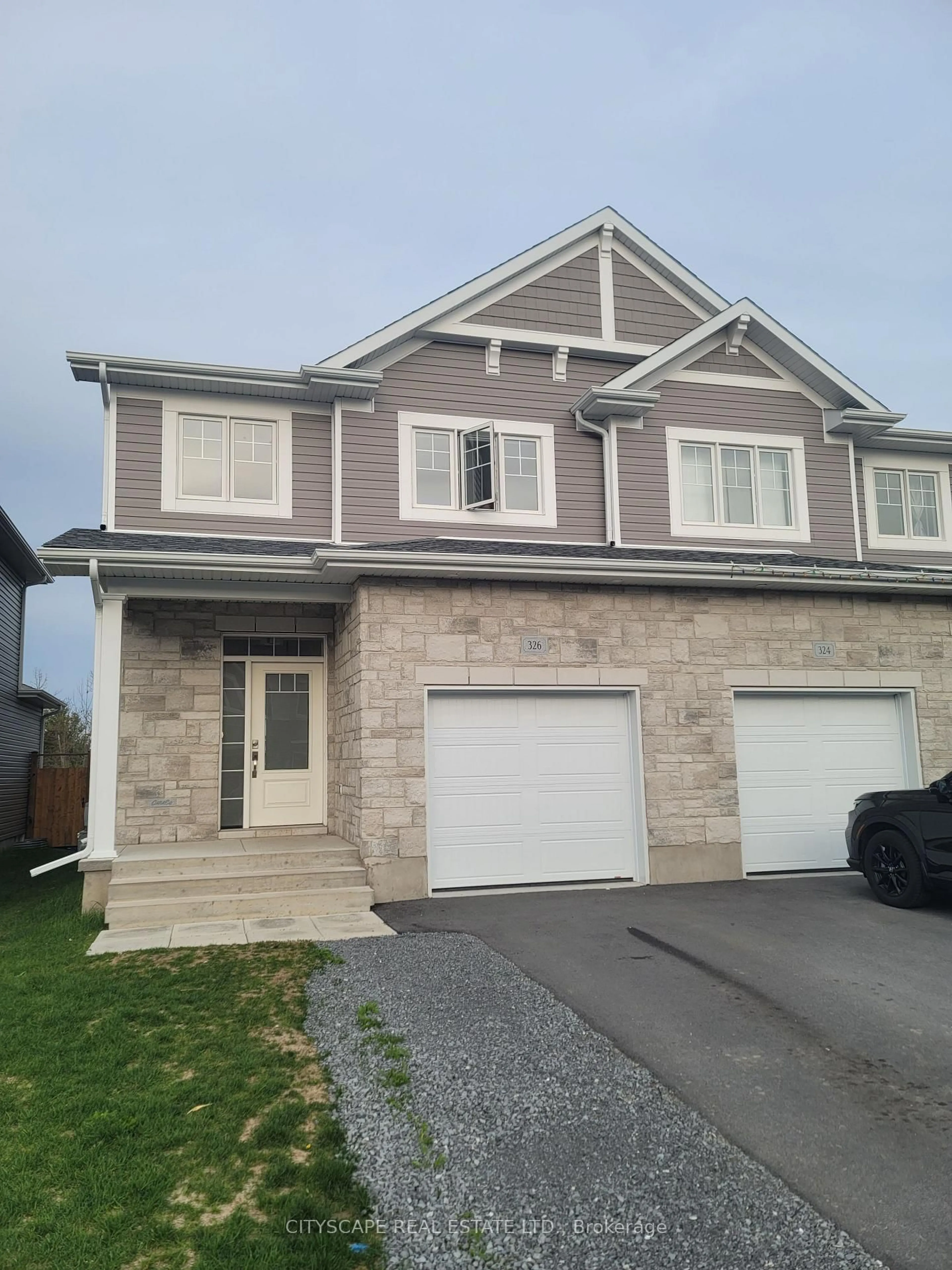 Home with vinyl exterior material, street for 326 Buckthorn Dr, Kingston Ontario K7P 0S1