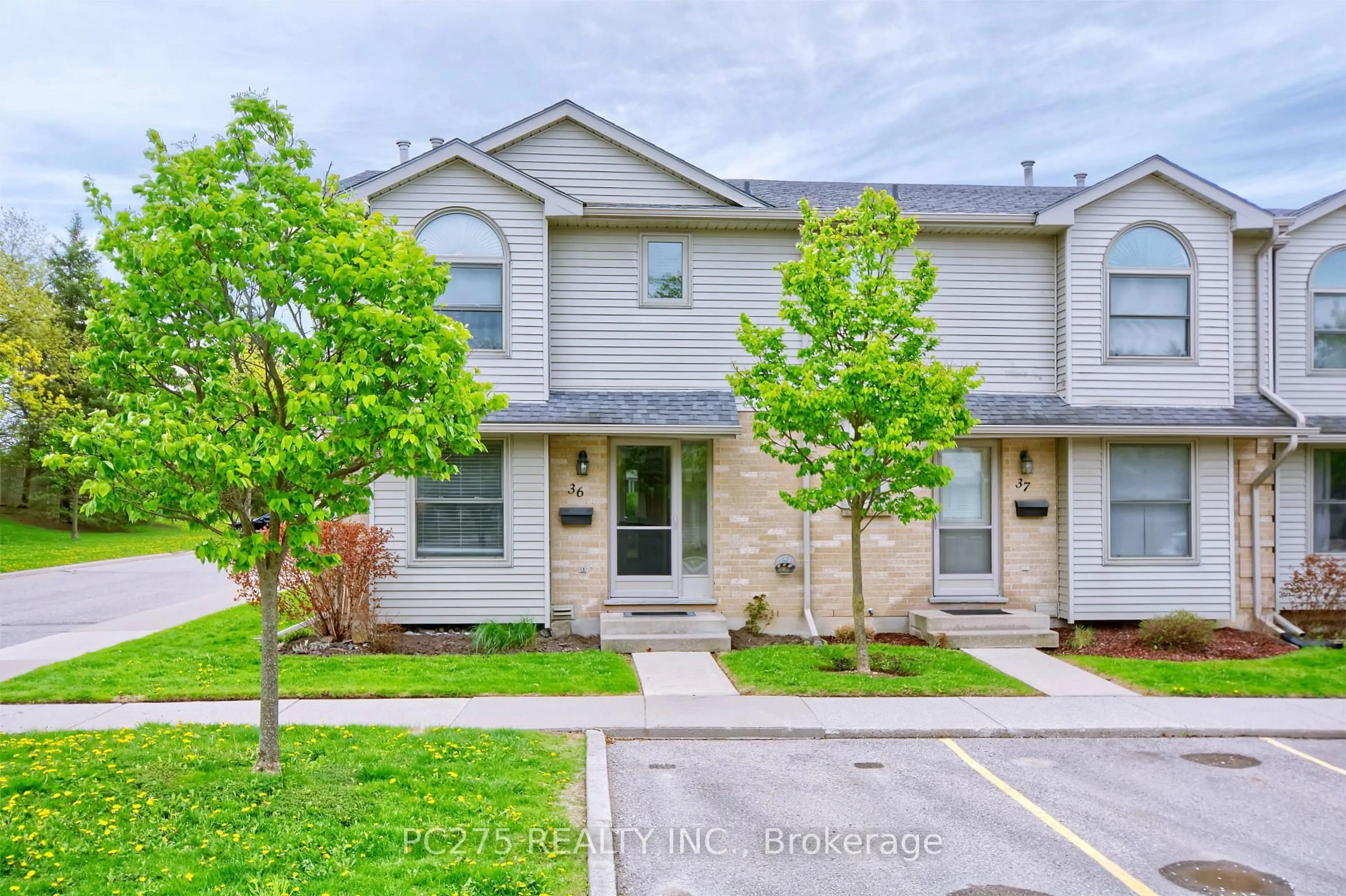 A pic from outside/outdoor area/front of a property/back of a property/a pic from drone, street for 141 Condor Crt #36, London East Ontario N5W 6A1
