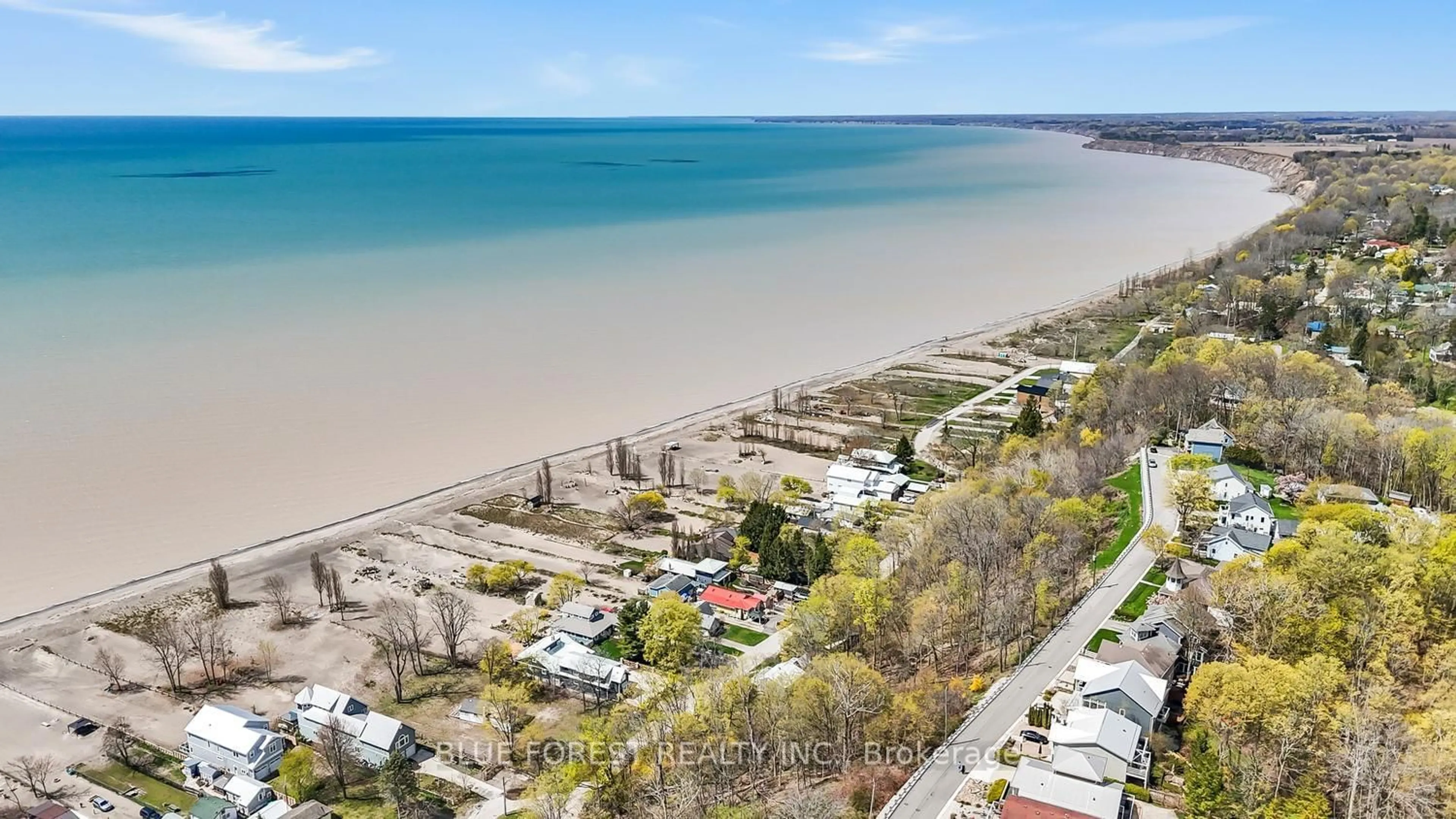 A pic from outside/outdoor area/front of a property/back of a property/a pic from drone, water/lake/river/ocean view for 413 Front St, Central Elgin Ontario N5L 1G2