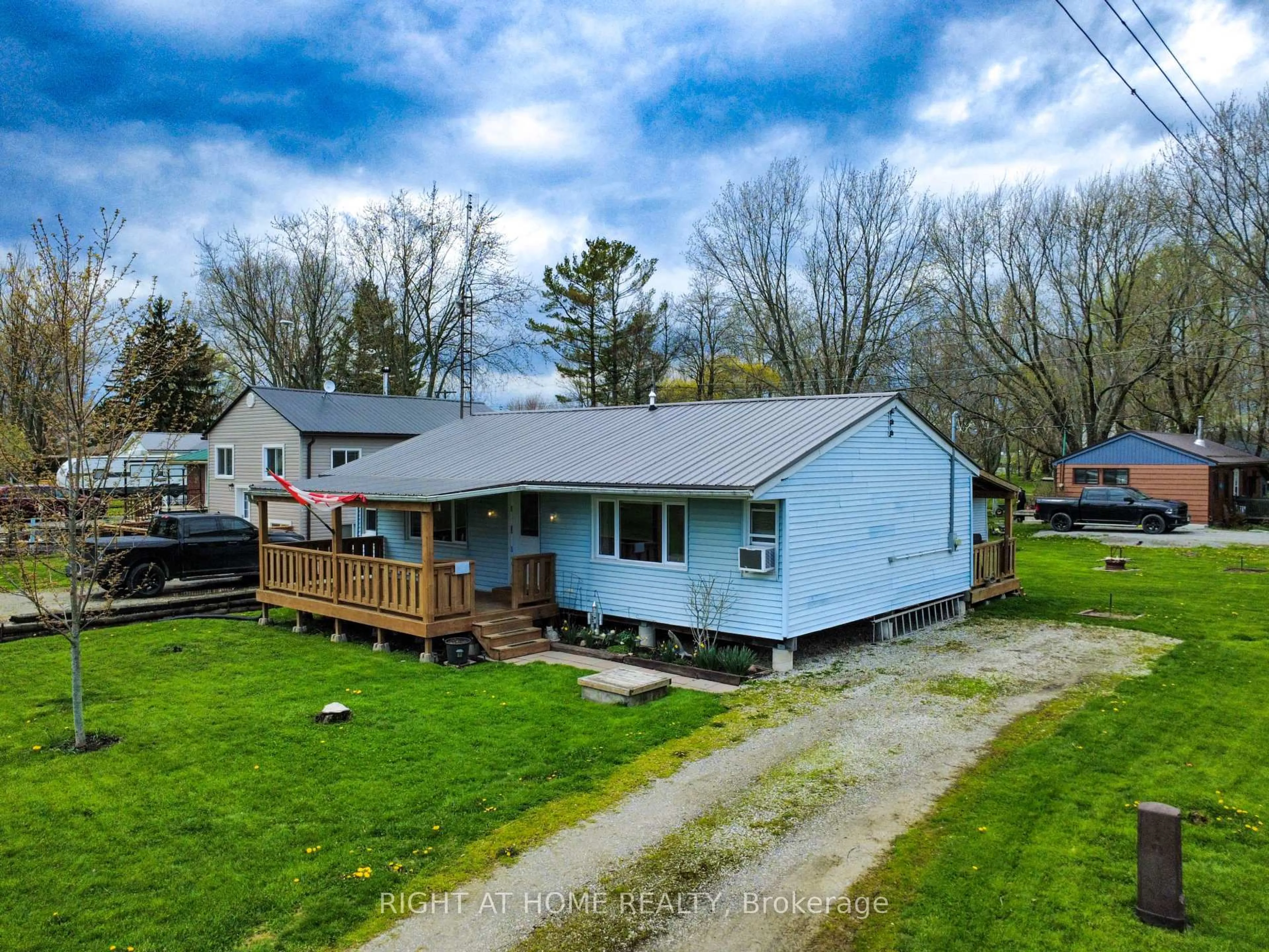 A pic from outside/outdoor area/front of a property/back of a property/a pic from drone, water/lake/river/ocean view for 21 Lakeview Lane, Haldimand Ontario N0A 1P0