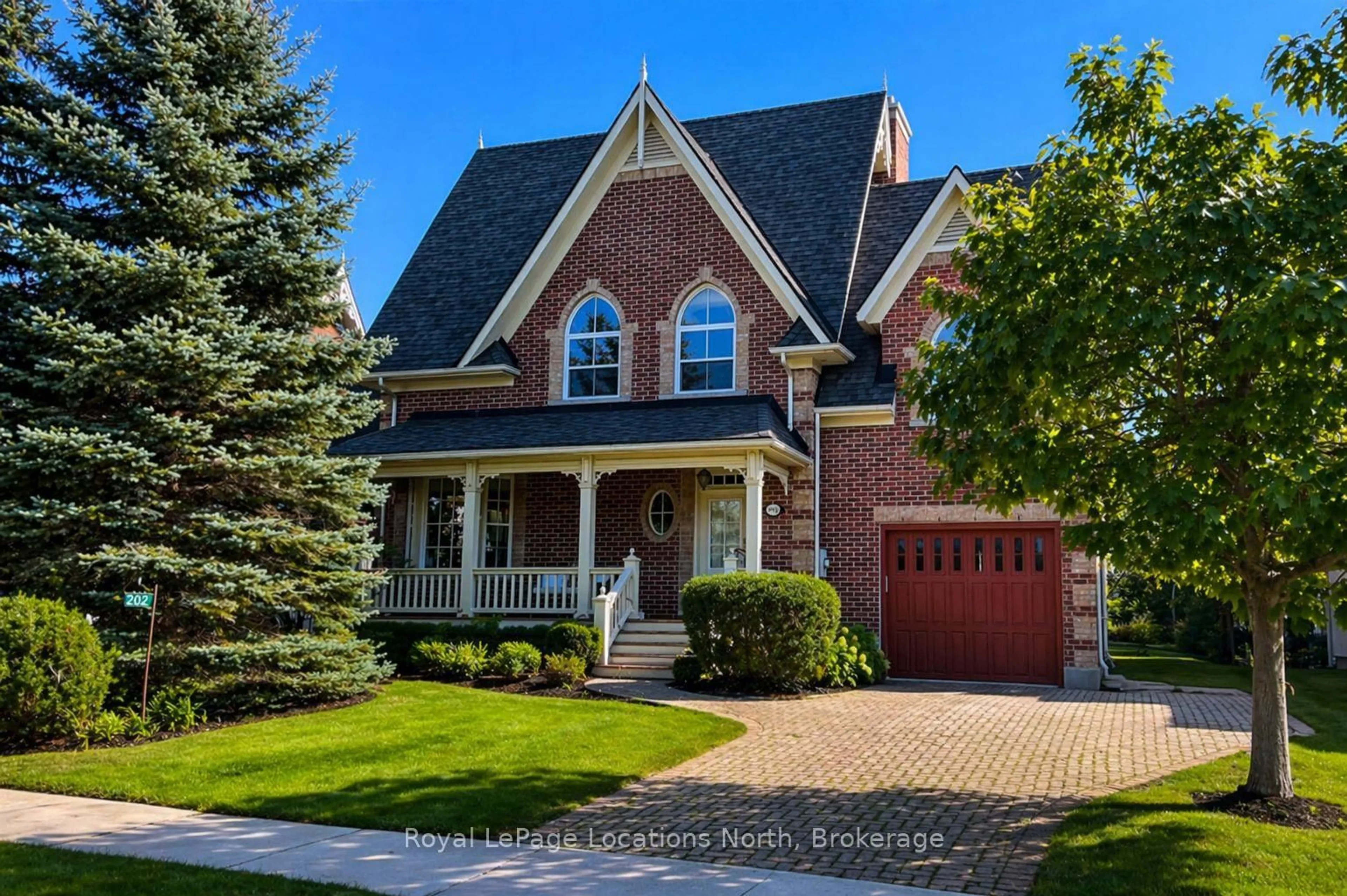 Home with brick exterior material, street for 202 Snowbridge Way, Blue Mountains Ontario L9Y 0V1