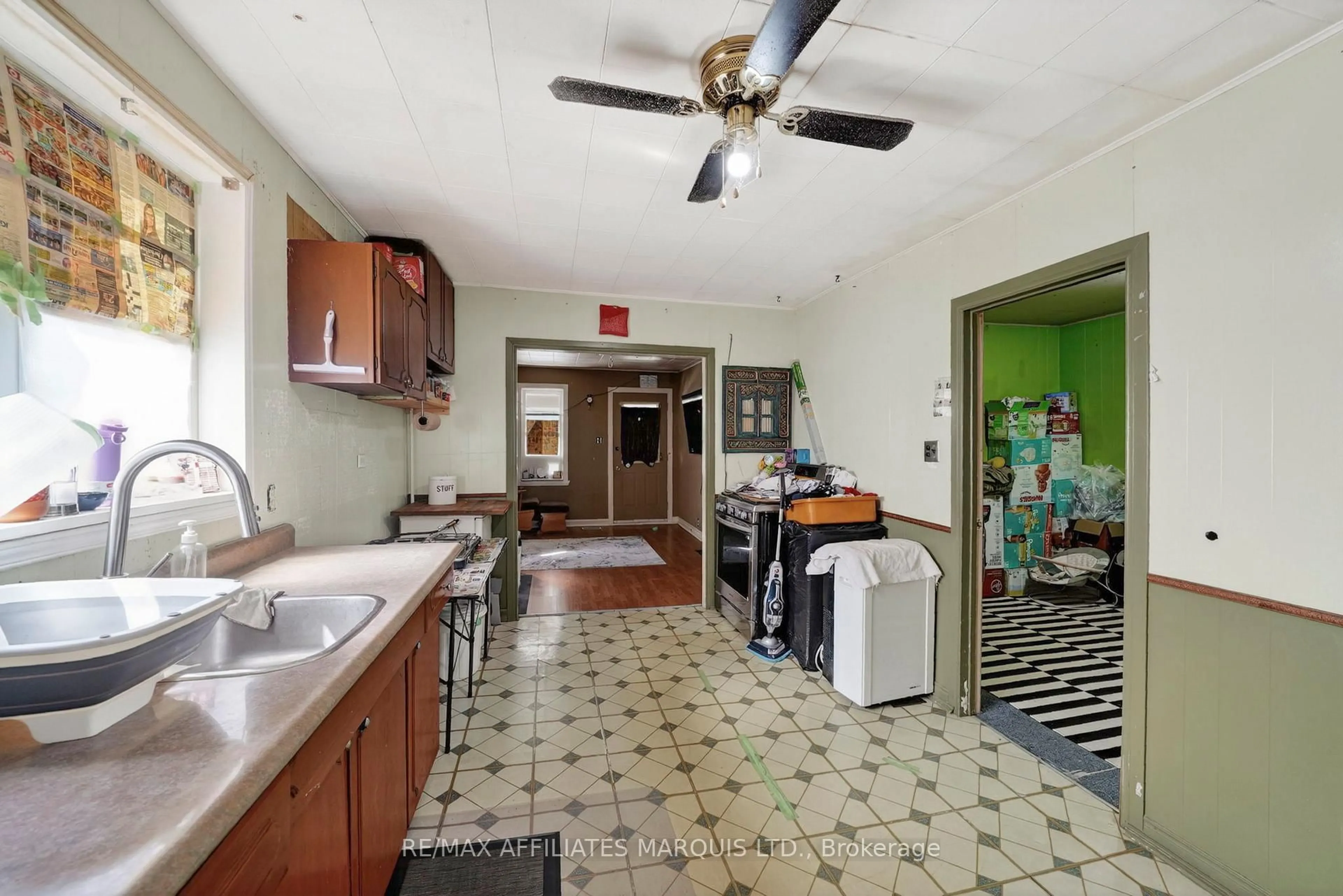 Kitchen with laundary machines, ceramic/tile floor for 505 Cumberland St, Cornwall Ontario K6J 4J3