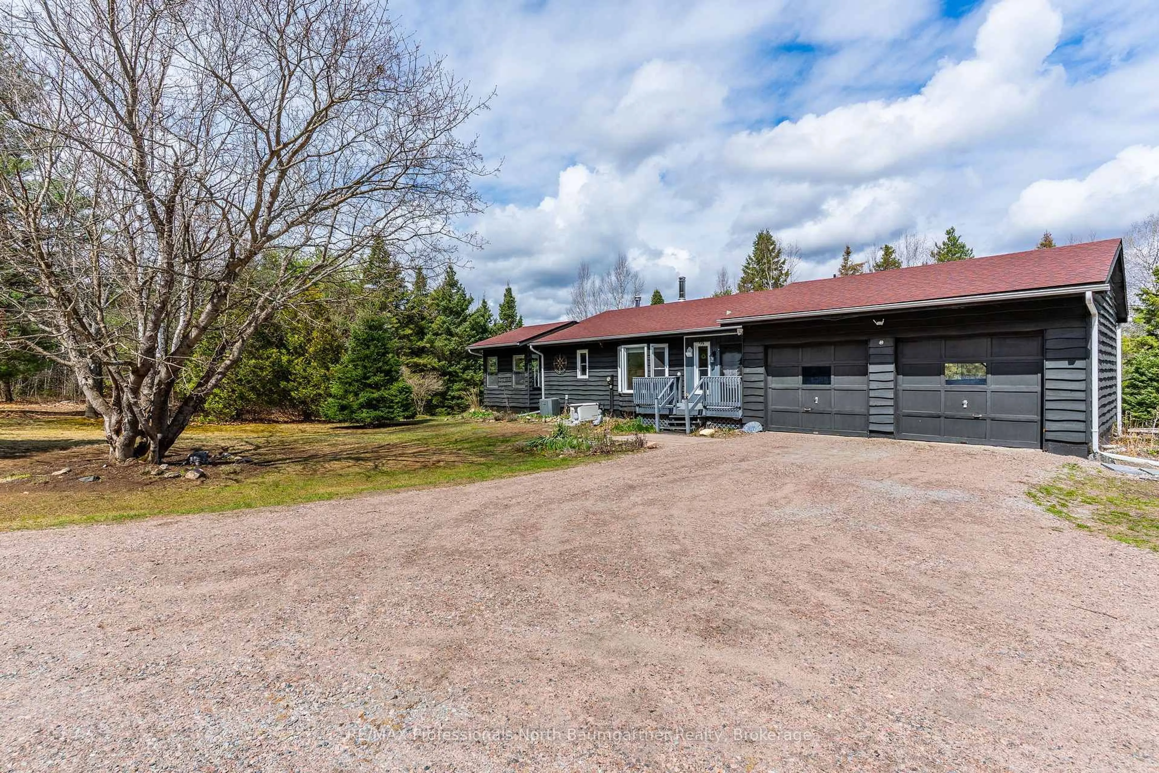 A pic from outside/outdoor area/front of a property/back of a property/a pic from drone, unknown for 1591 Irondale Rd, Highlands East Ontario K0M 1X0