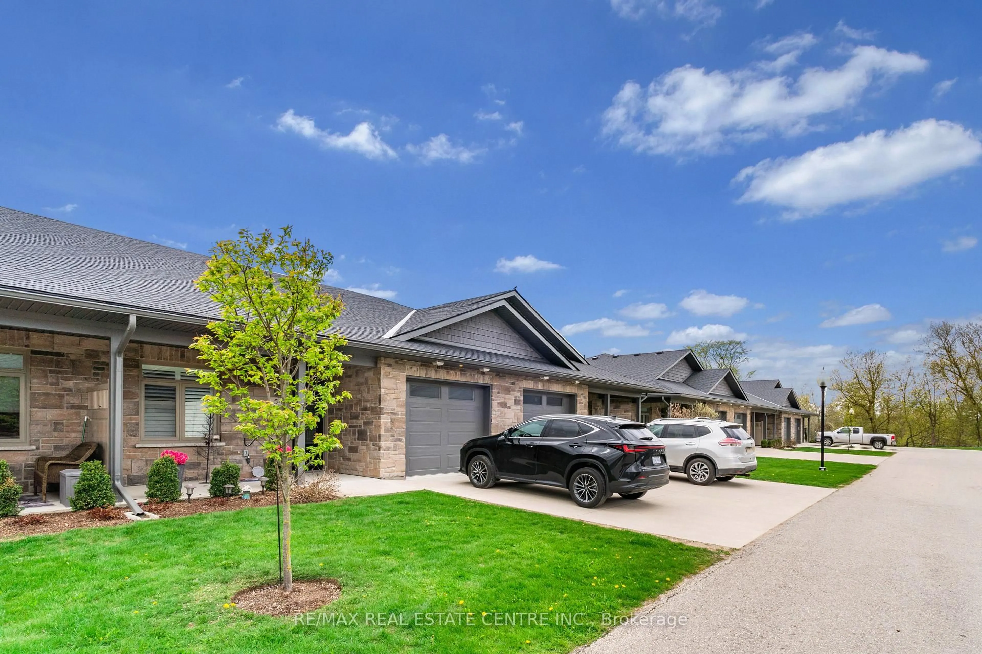 Home with brick exterior material, street for 375 Mitchell Rd #54, North Perth Ontario N4W 0H4