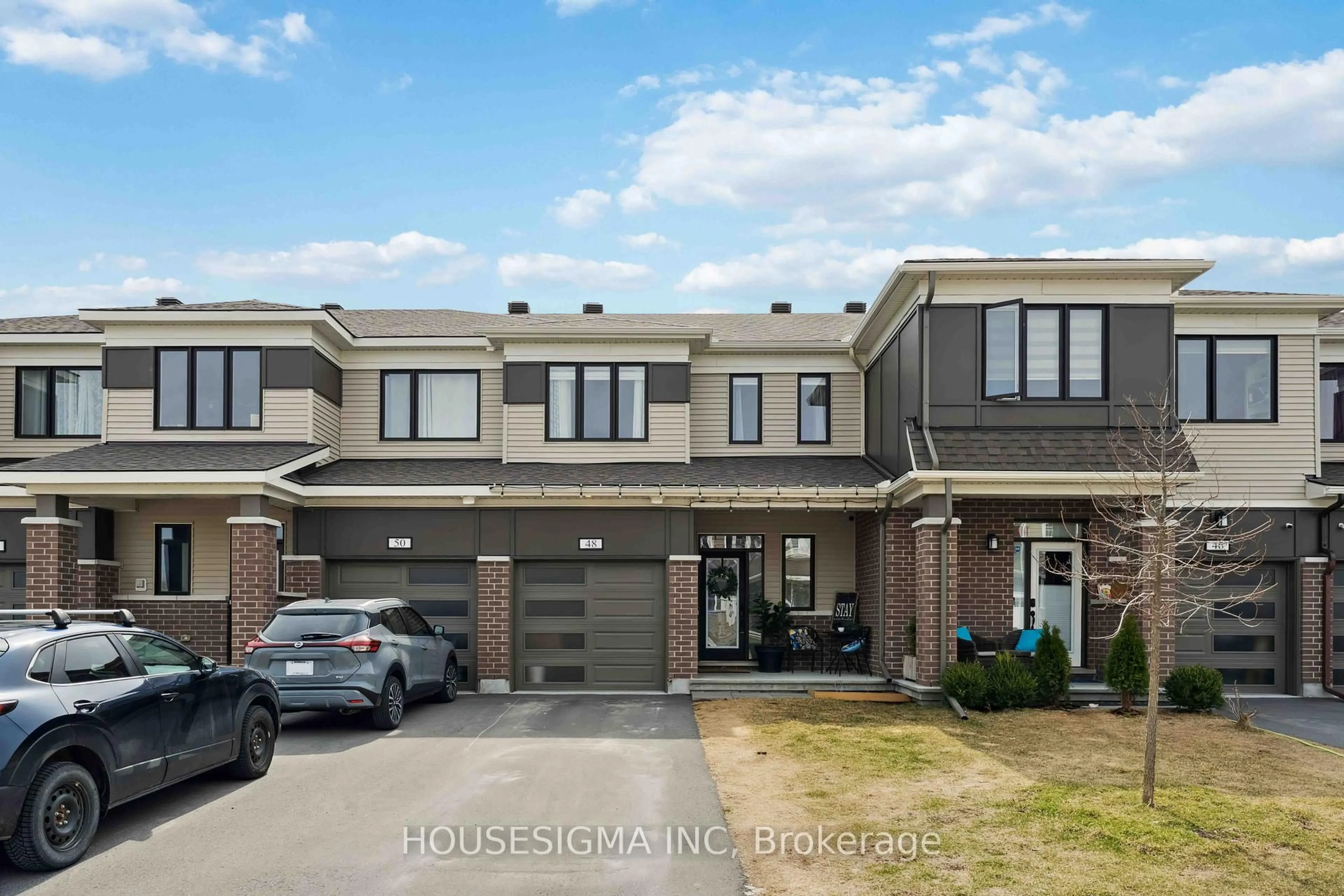 Home with brick exterior material, street for 48 Bermondsey Way, Ottawa Ontario K2S 2Y7