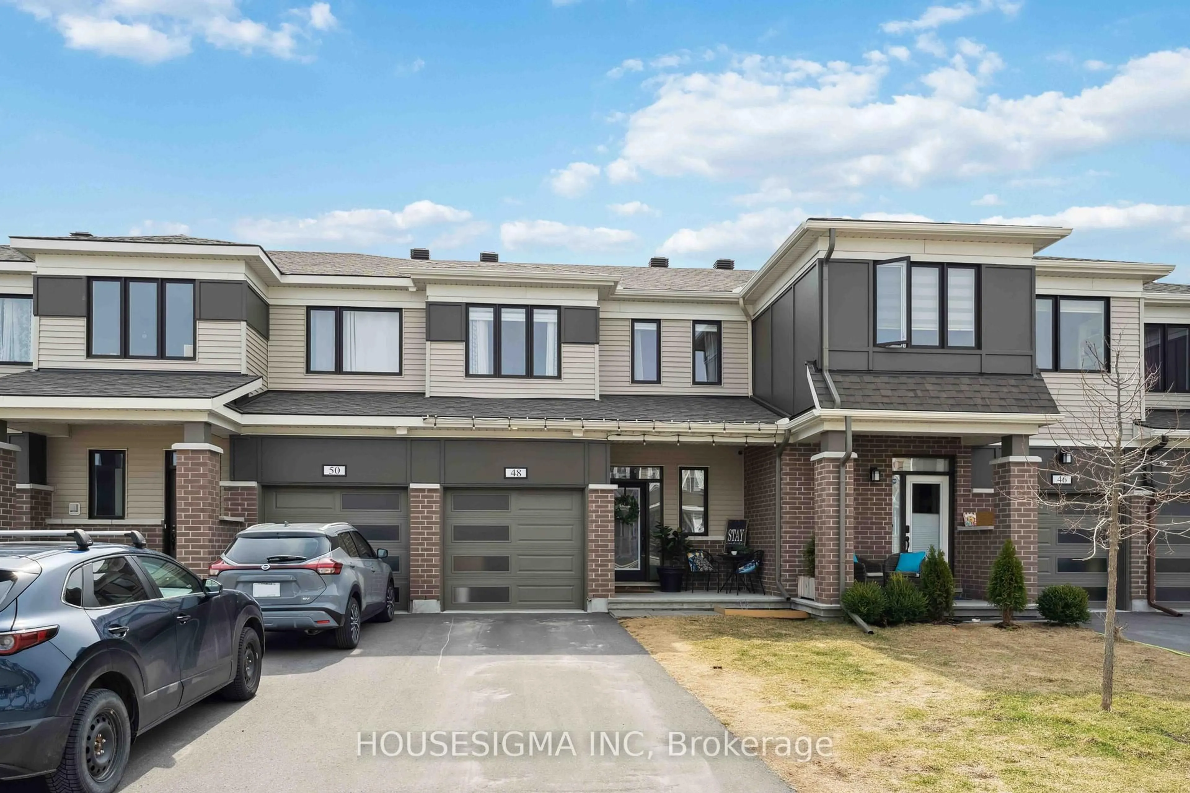 Home with brick exterior material, street for 48 Bermondsey Way, Ottawa Ontario K2S 2Y7