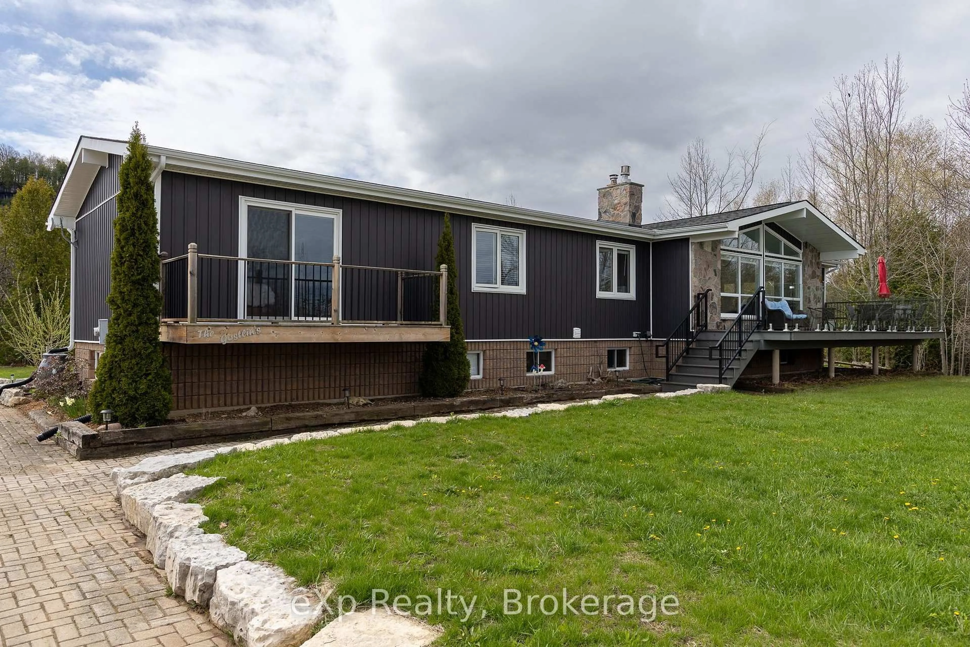 A pic from outside/outdoor area/front of a property/back of a property/a pic from drone, water/lake/river/ocean view for 502754 Grey Road 1, Georgian Bluffs Ontario N0H 2T0