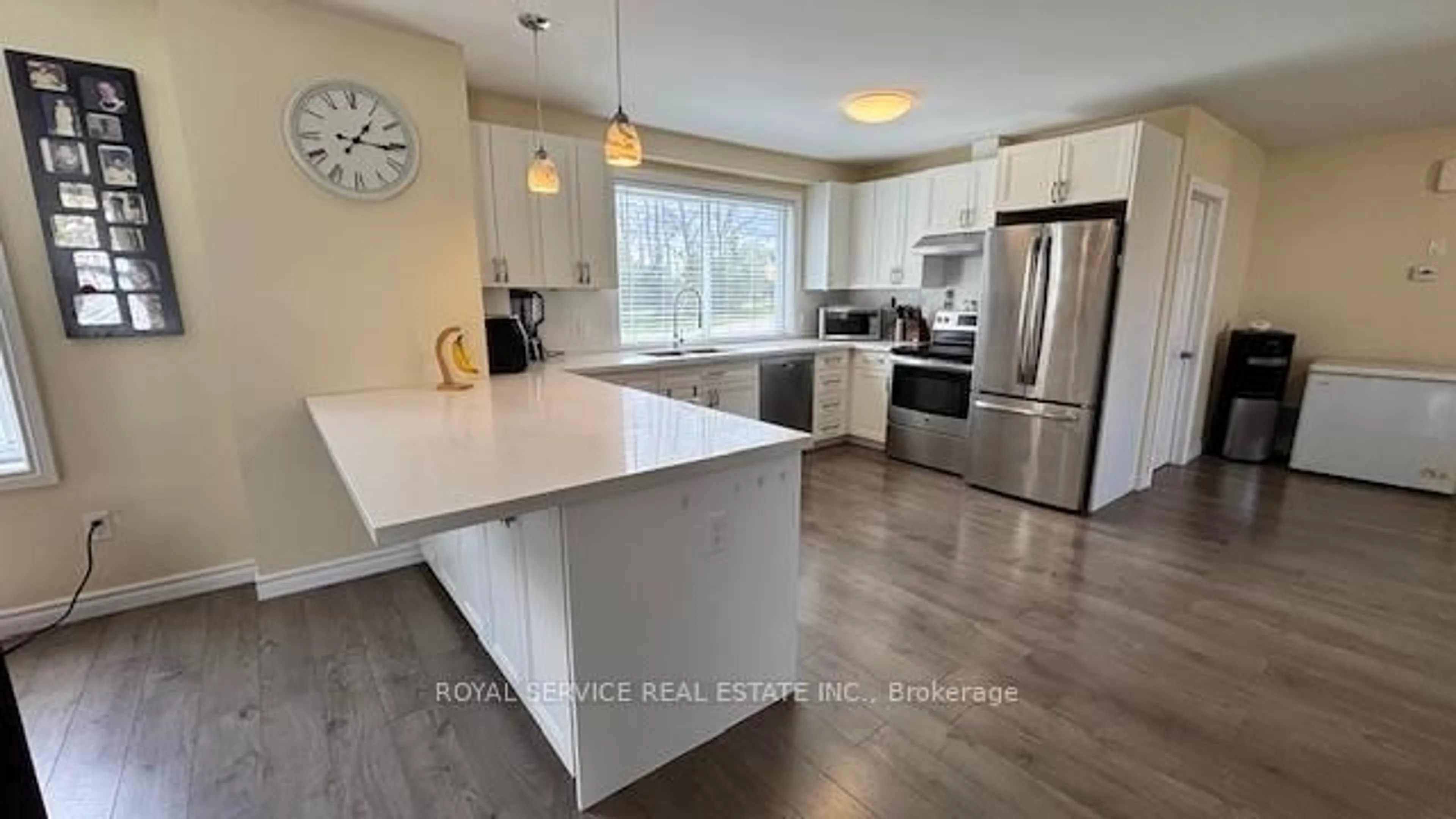 Open concept kitchen, wood/laminate floor for 556 County 28 Rd, Cavan Monaghan Ontario K0L 1B0