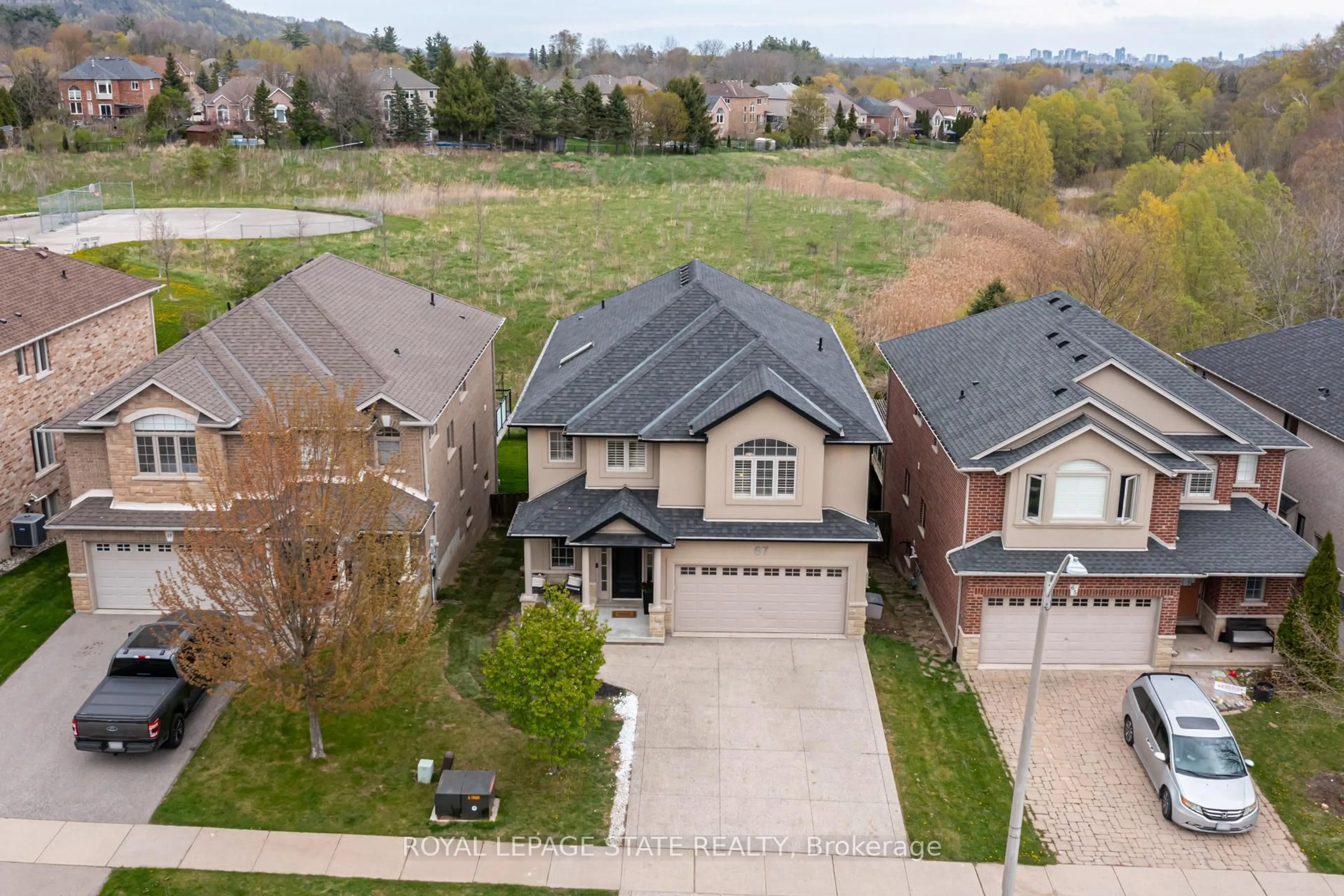 A pic from outside/outdoor area/front of a property/back of a property/a pic from drone, street for 67 Newcombe Rd, Hamilton Ontario L9H 7T3
