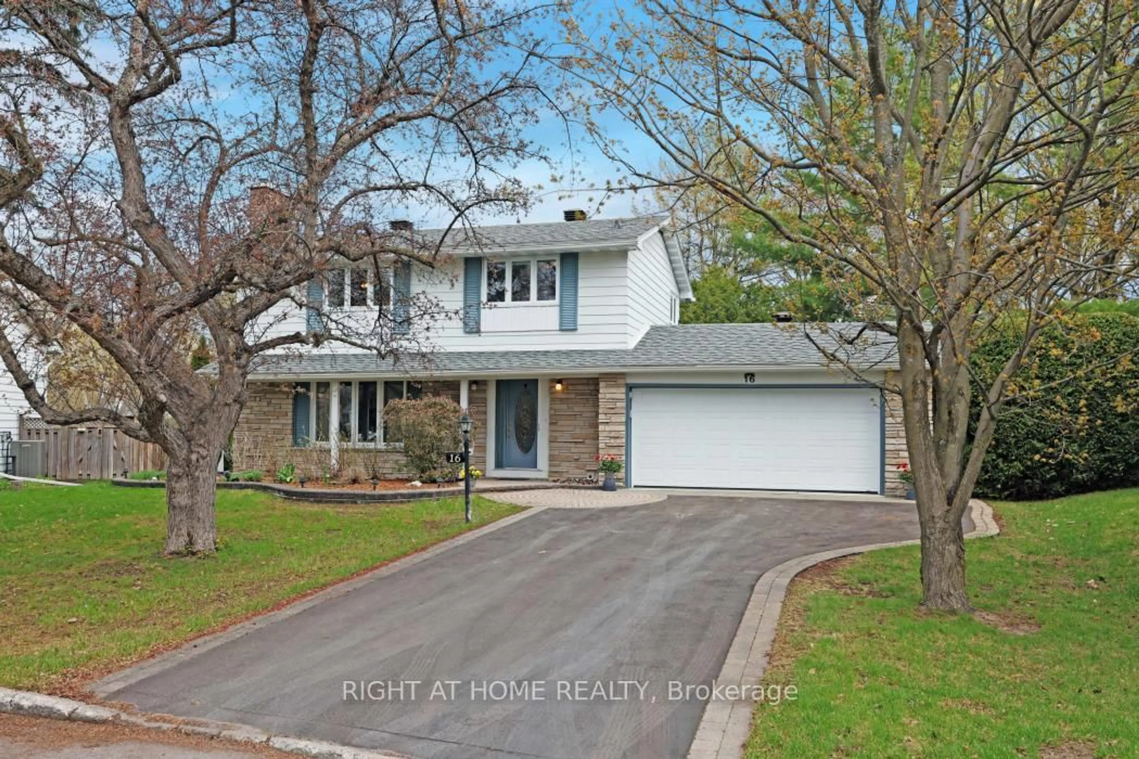 Home with vinyl exterior material, street for 16 Lambert Dr, Ottawa Ontario K2H 5Y4