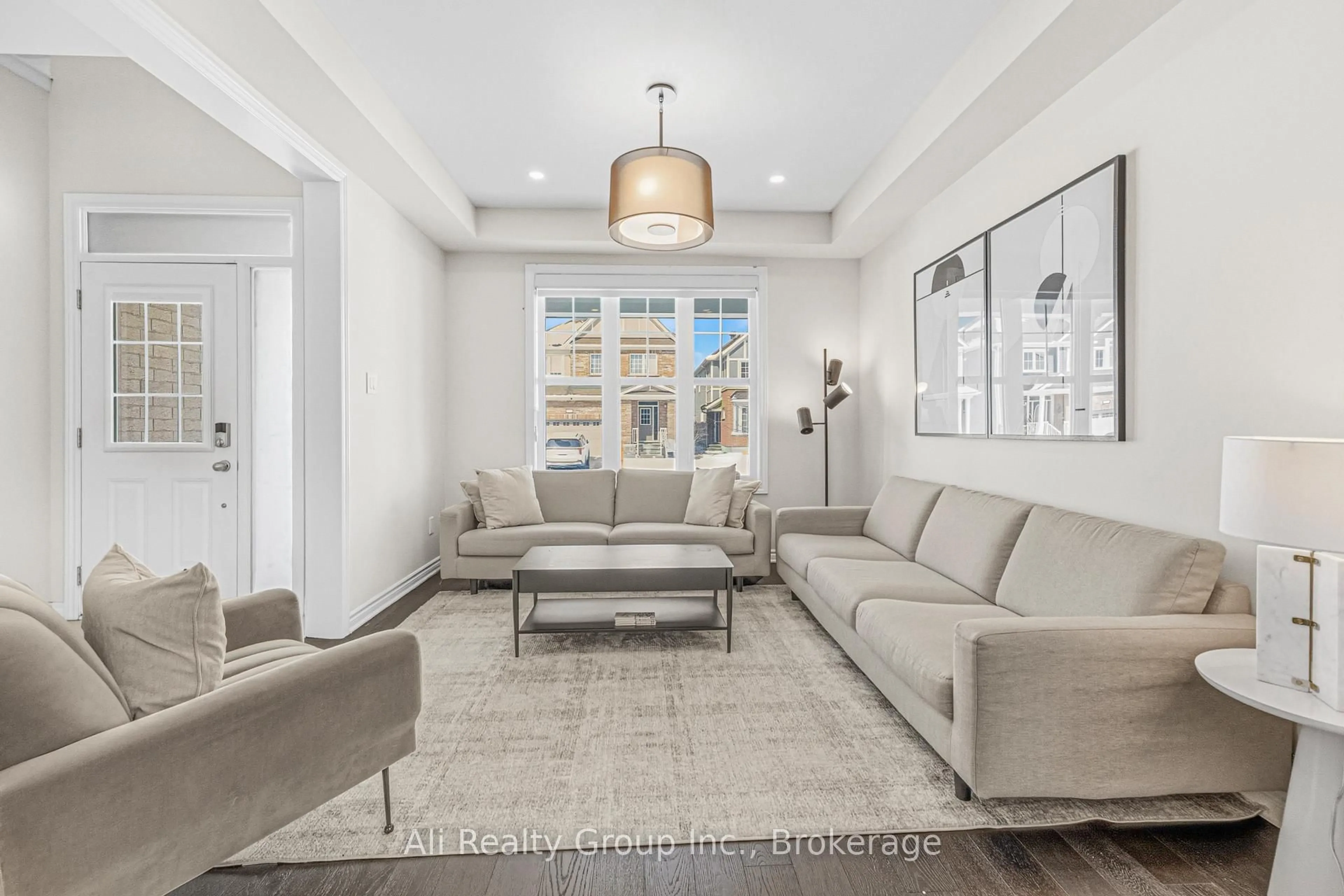 Living room with furniture, ceramic/tile floor for 38 Mudminnow Cres, Ottawa Ontario K4A 5H8
