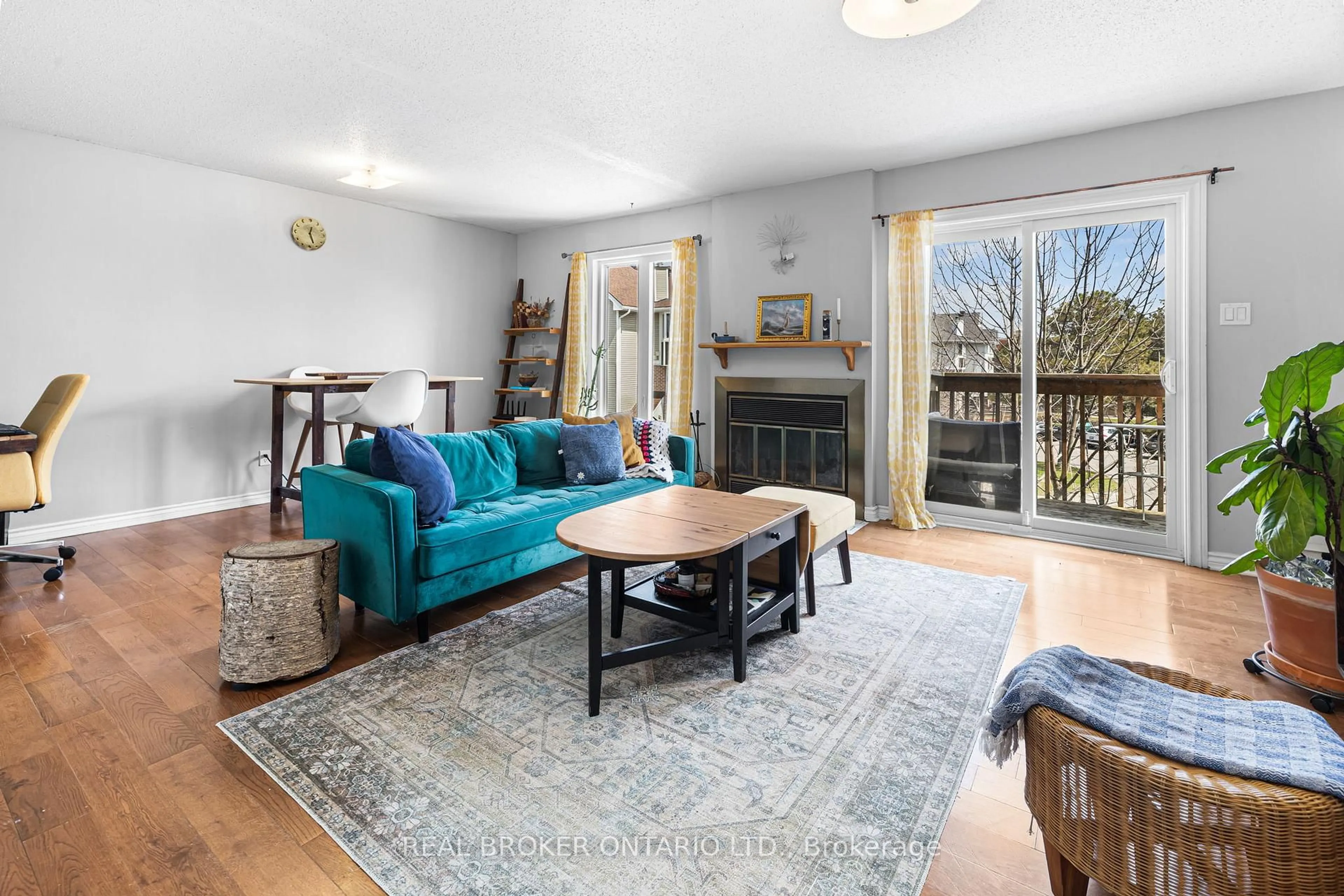 Living room with furniture, wood/laminate floor for 7 Timberview Way #3, Ottawa Ontario K2H 9M5