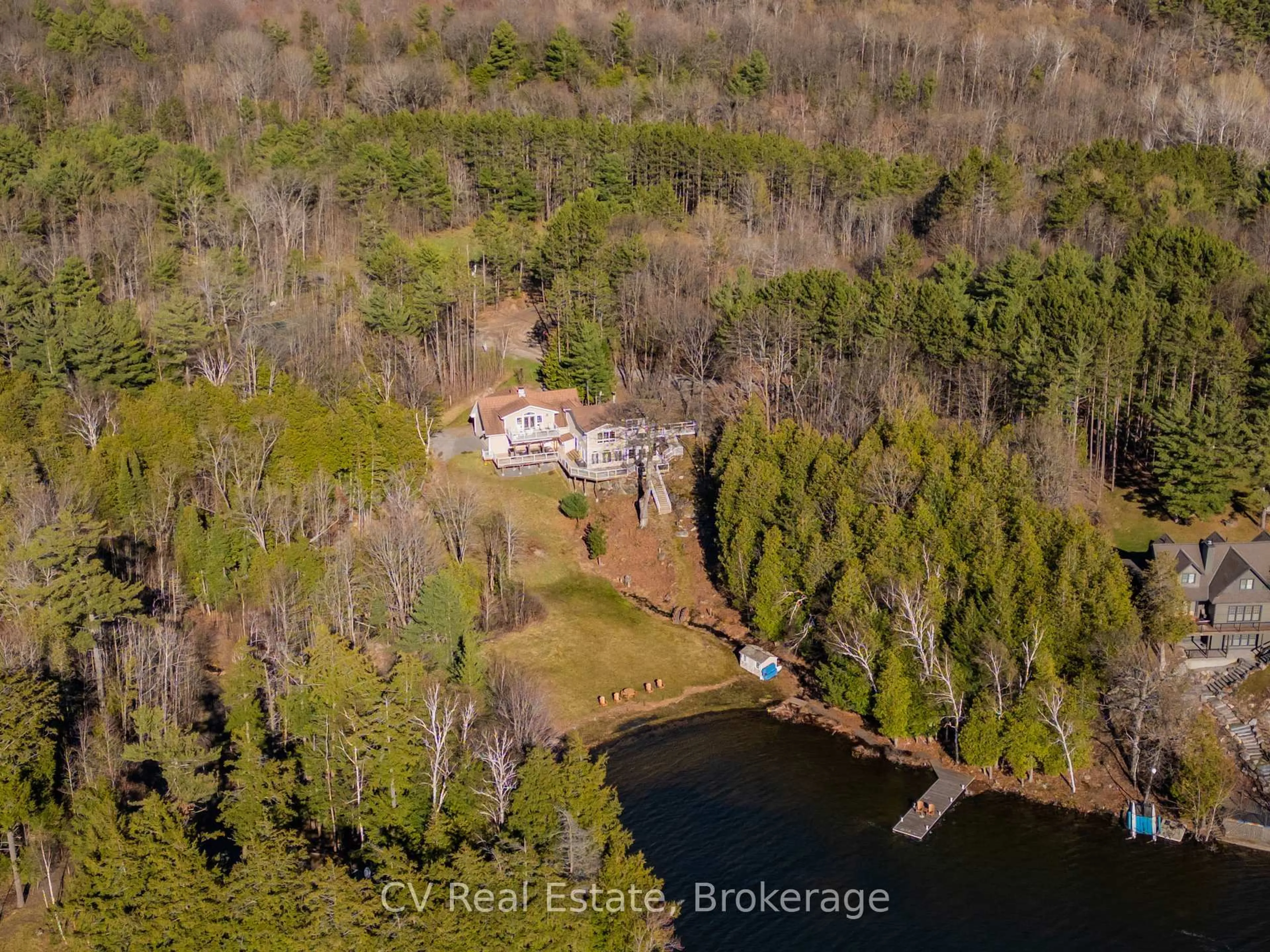 A pic from outside/outdoor area/front of a property/back of a property/a pic from drone, water/lake/river/ocean view for 1391 Rosseau Lake Road 1 #3, Muskoka Lakes Ontario P0B 1M0