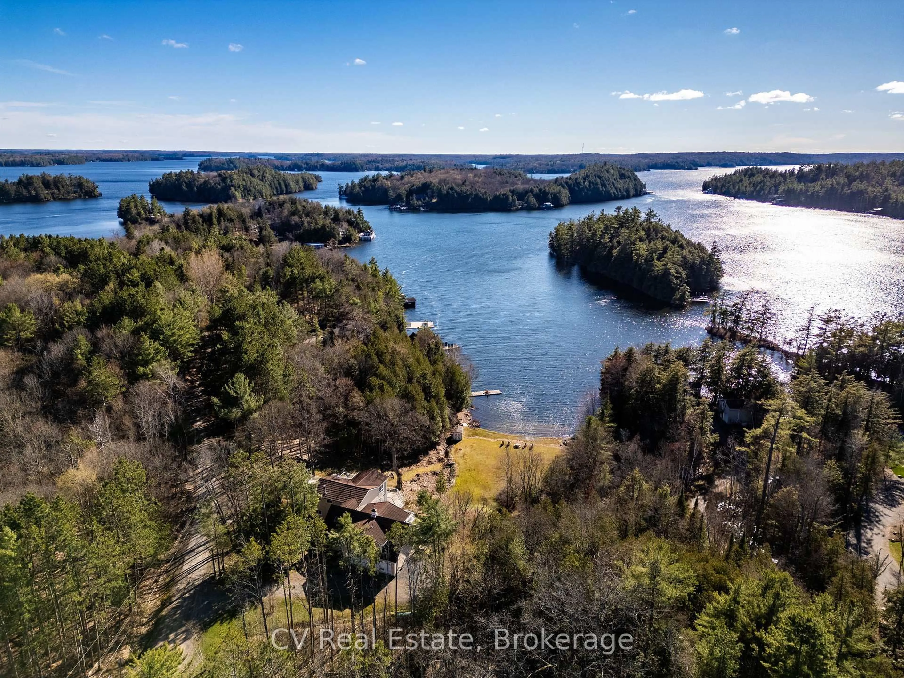 A pic from outside/outdoor area/front of a property/back of a property/a pic from drone, water/lake/river/ocean view for 1391 Rosseau Lake Road 1 #3, Muskoka Lakes Ontario P0B 1M0