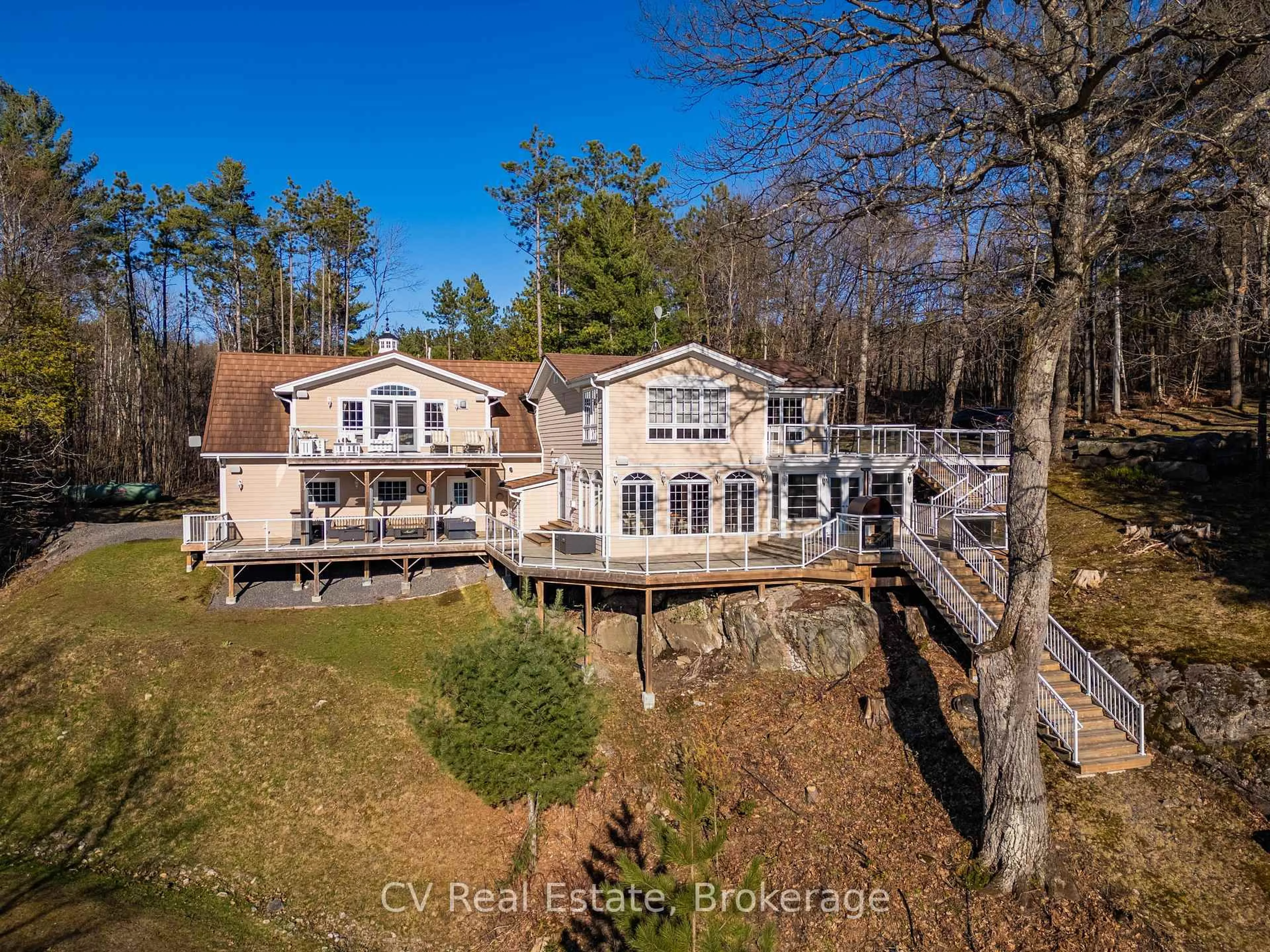 A pic from outside/outdoor area/front of a property/back of a property/a pic from drone, water/lake/river/ocean view for 1391 Rosseau Lake Road 1 #3, Muskoka Lakes Ontario P0B 1M0