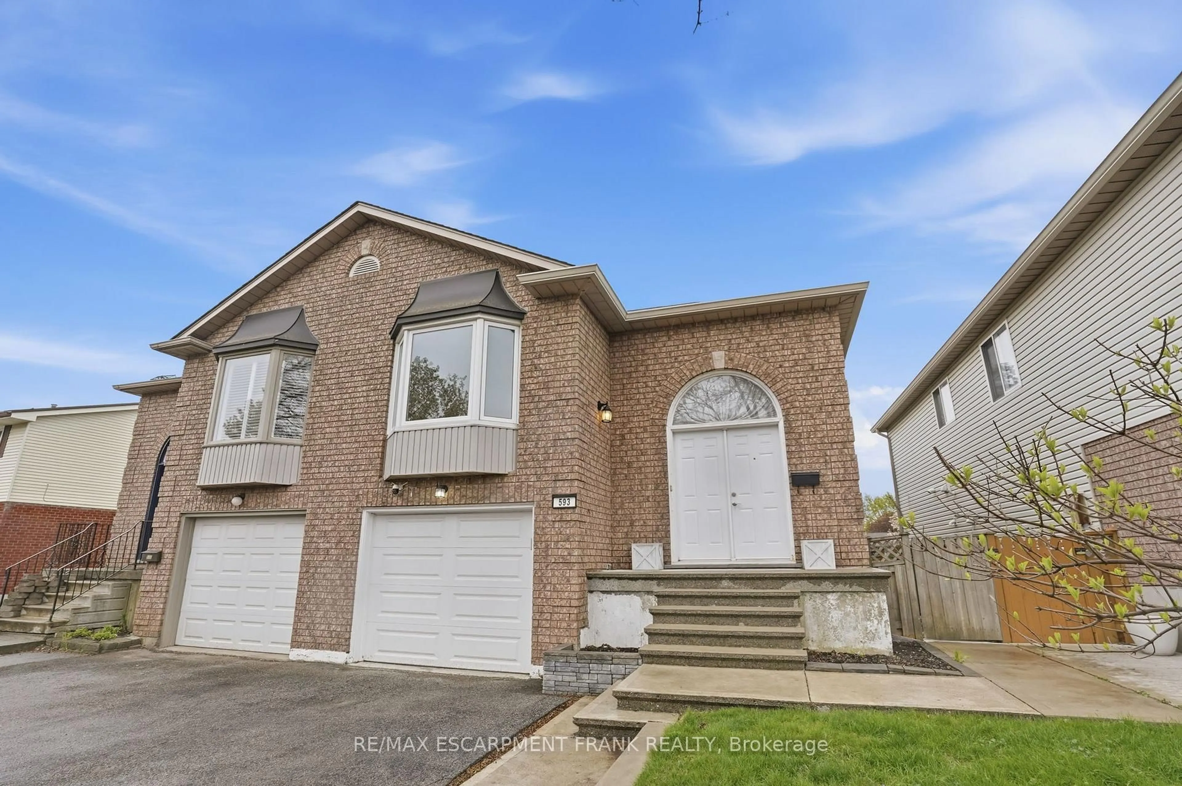 Home with brick exterior material, street for 593 Grey St, Brantford Ontario N3S 4X9