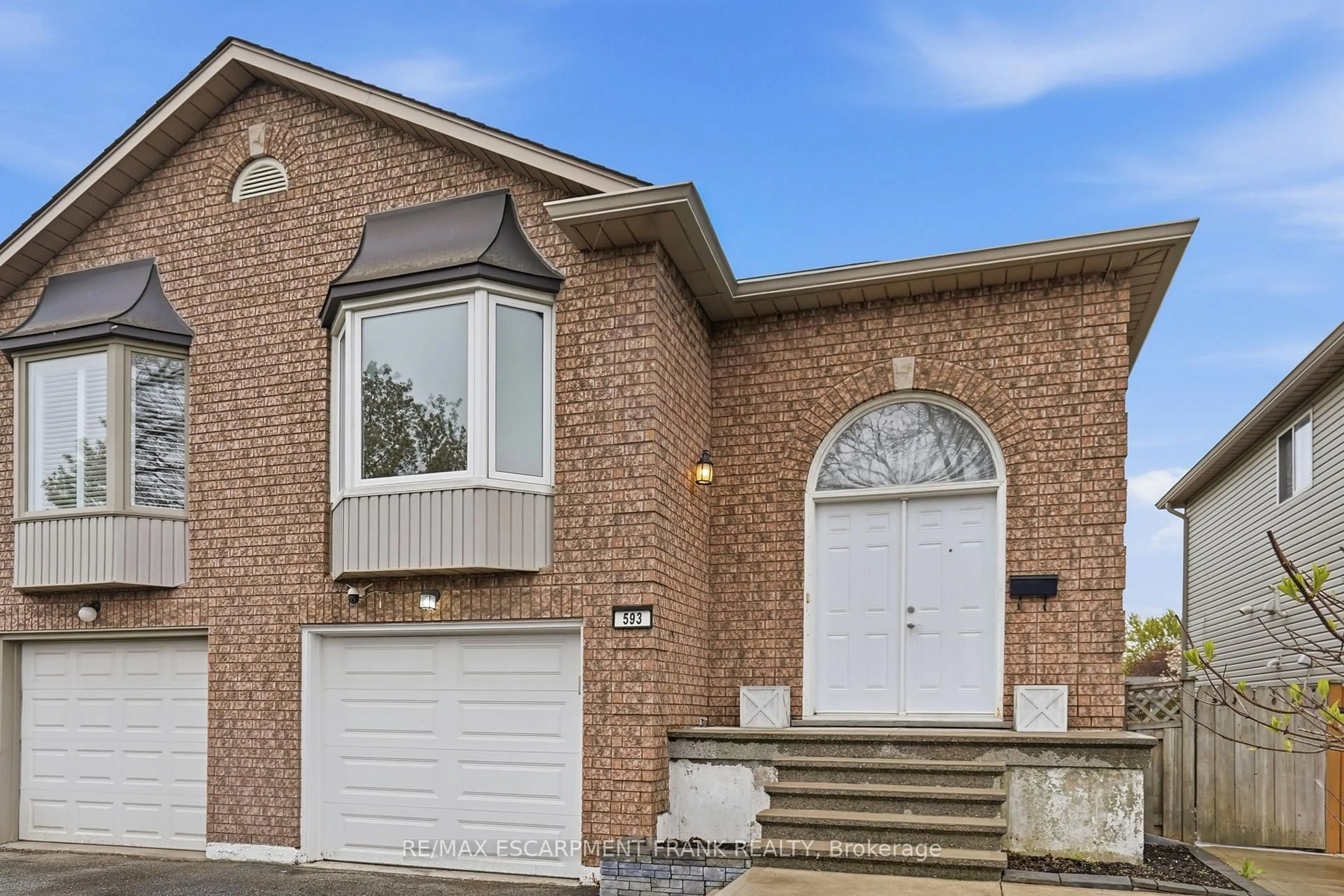 Home with brick exterior material, street for 593 Grey St, Brantford Ontario N3S 4X9