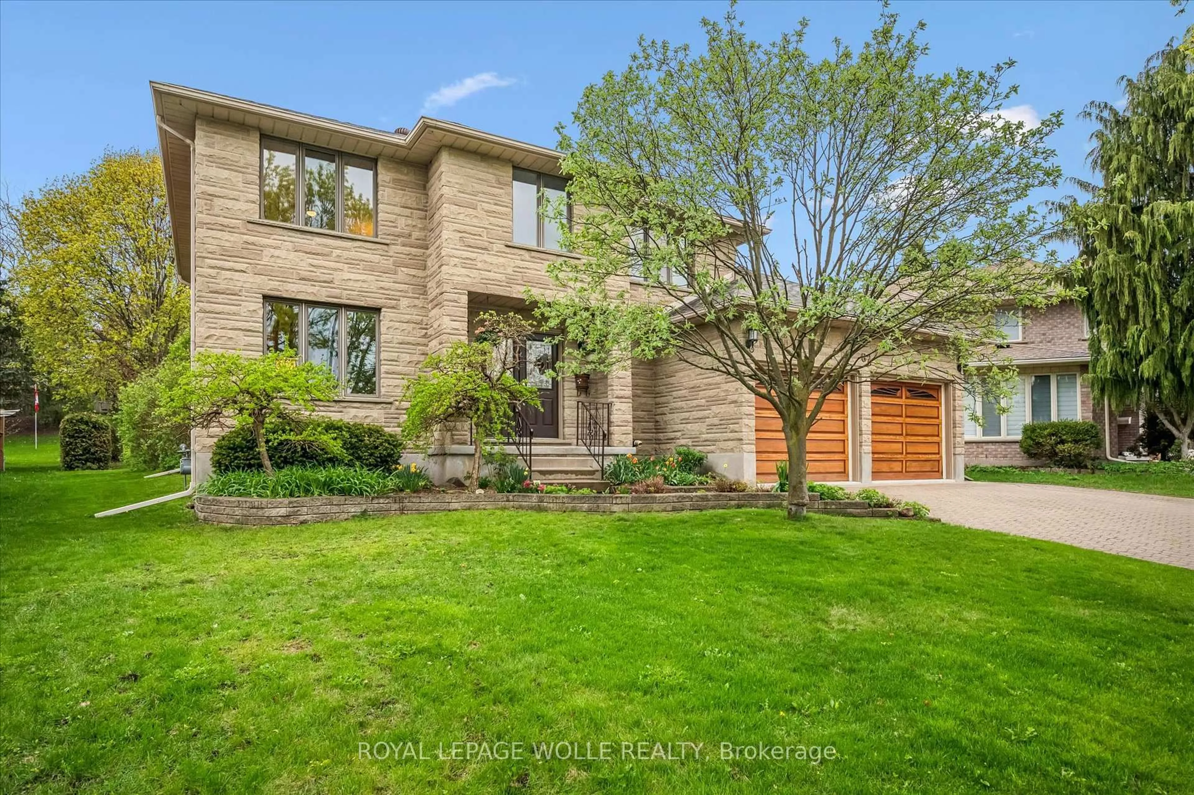 Home with brick exterior material, street for 82 Corfield Dr, Kitchener Ontario N2A 3W9