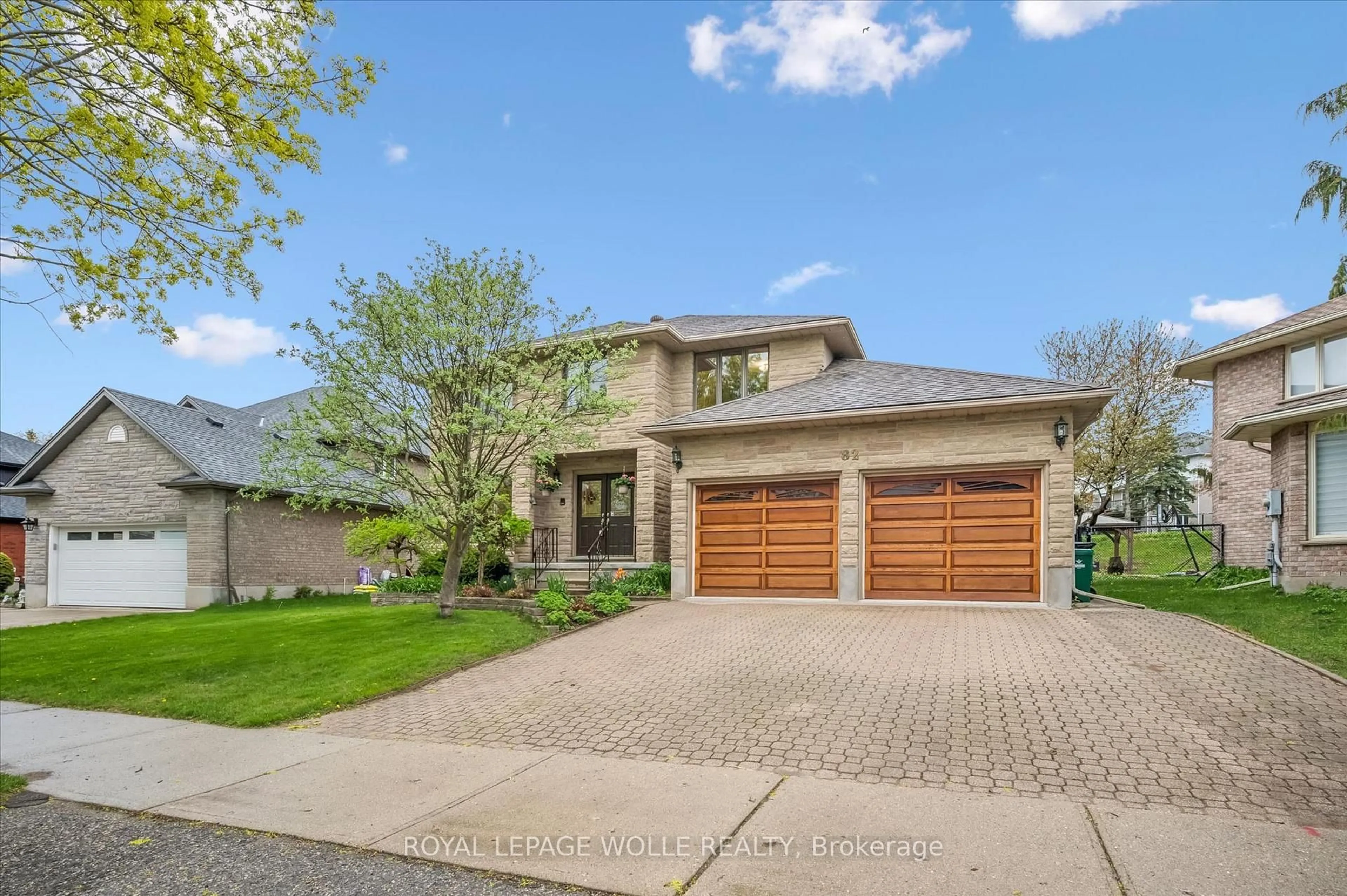 Home with brick exterior material, street for 82 Corfield Dr, Kitchener Ontario N2A 3W9
