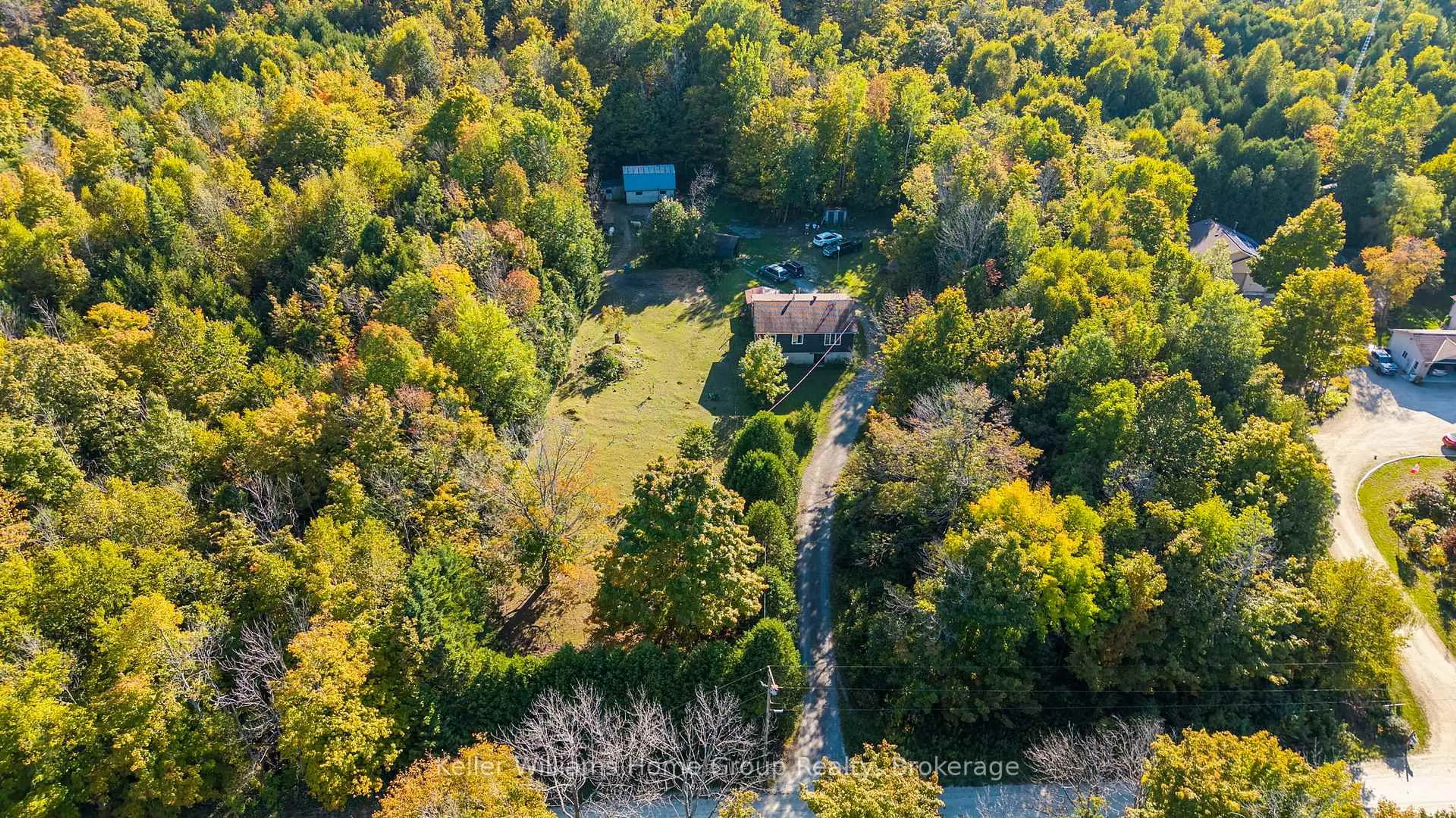 A pic from outside/outdoor area/front of a property/back of a property/a pic from drone, forest/trees view for 125 North Diagonal Rd, South Bruce Peninsula Ontario N0H 2T0