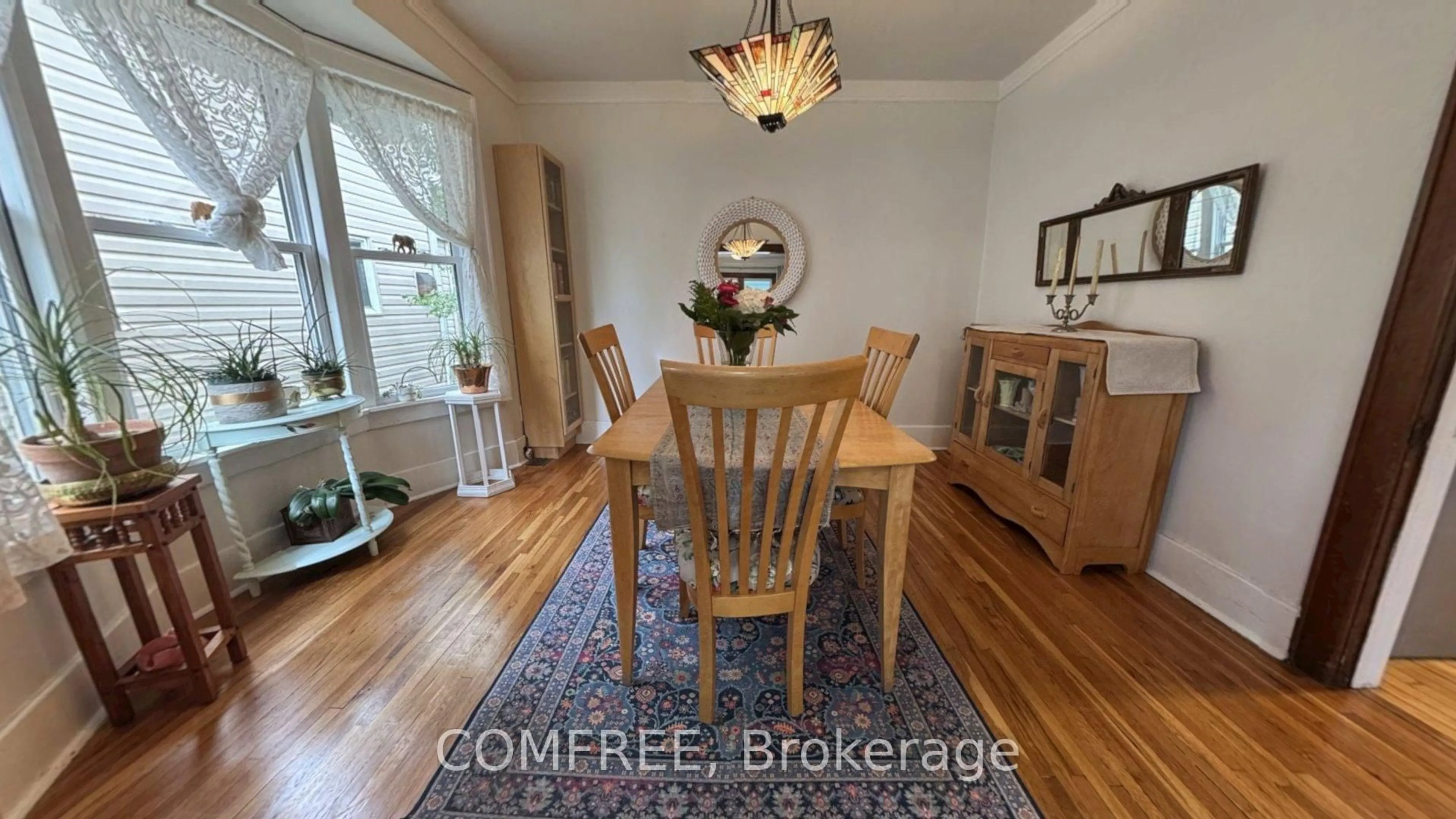 Dining room, wood/laminate floor for 441 McEwan Ave, Out of Area Ontario N9B 2E7