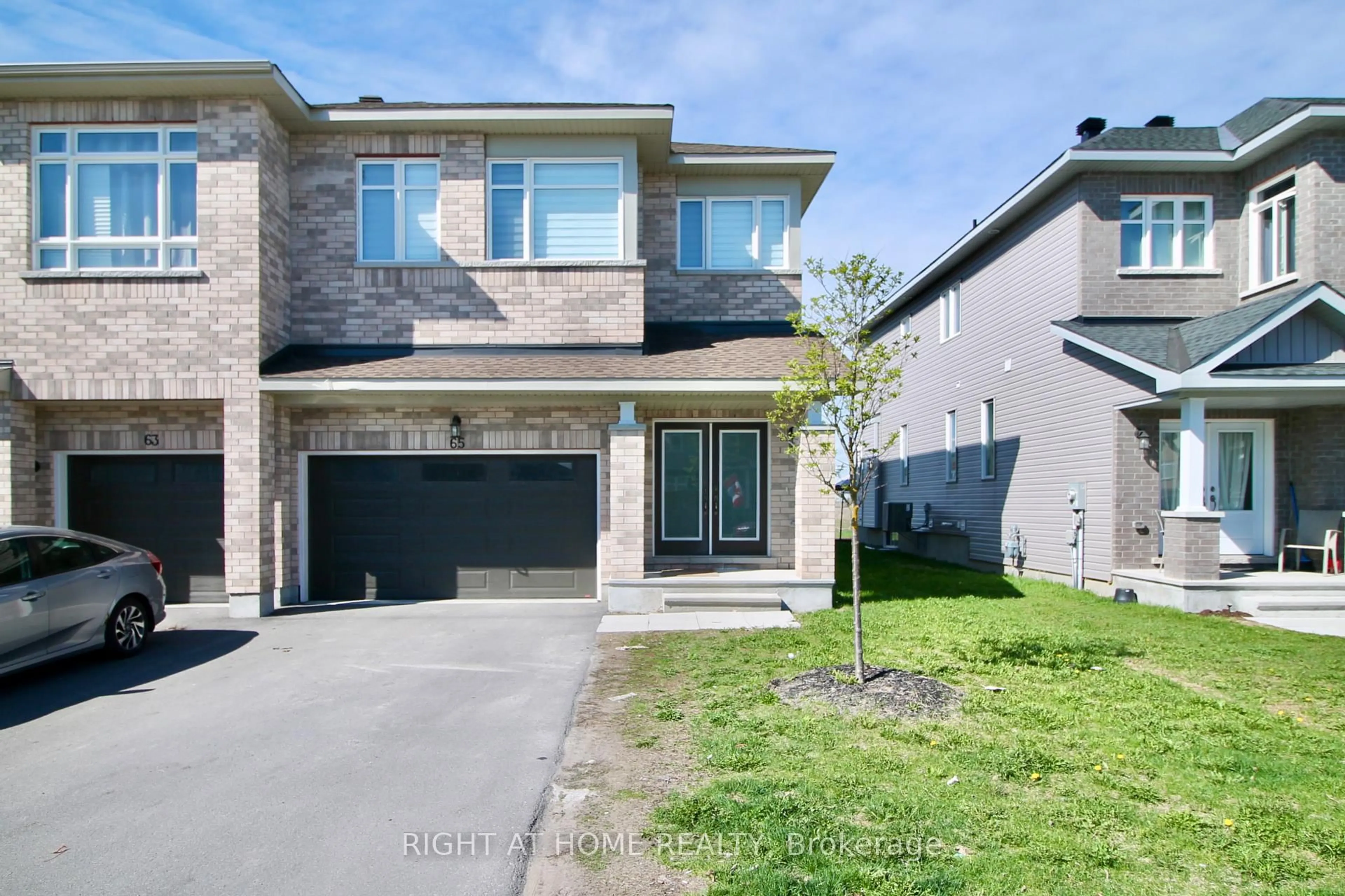 Home with brick exterior material, street for 65 Antonakos Dr, Carleton Place Ontario K7C 0L5