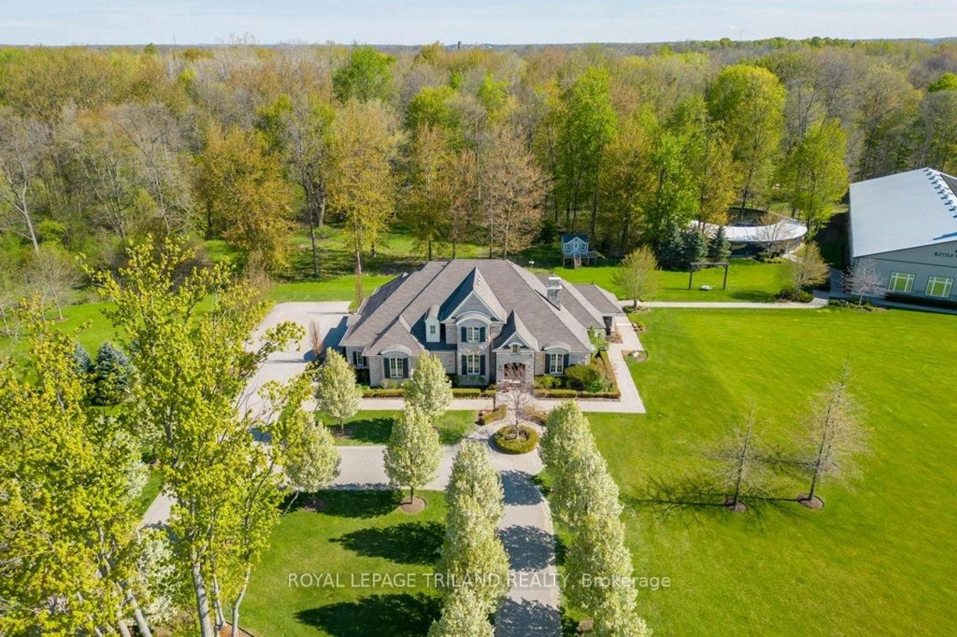A pic from outside/outdoor area/front of a property/back of a property/a pic from drone, unknown for 37612 John Wise Line, Southwold Ontario N5P 3T2