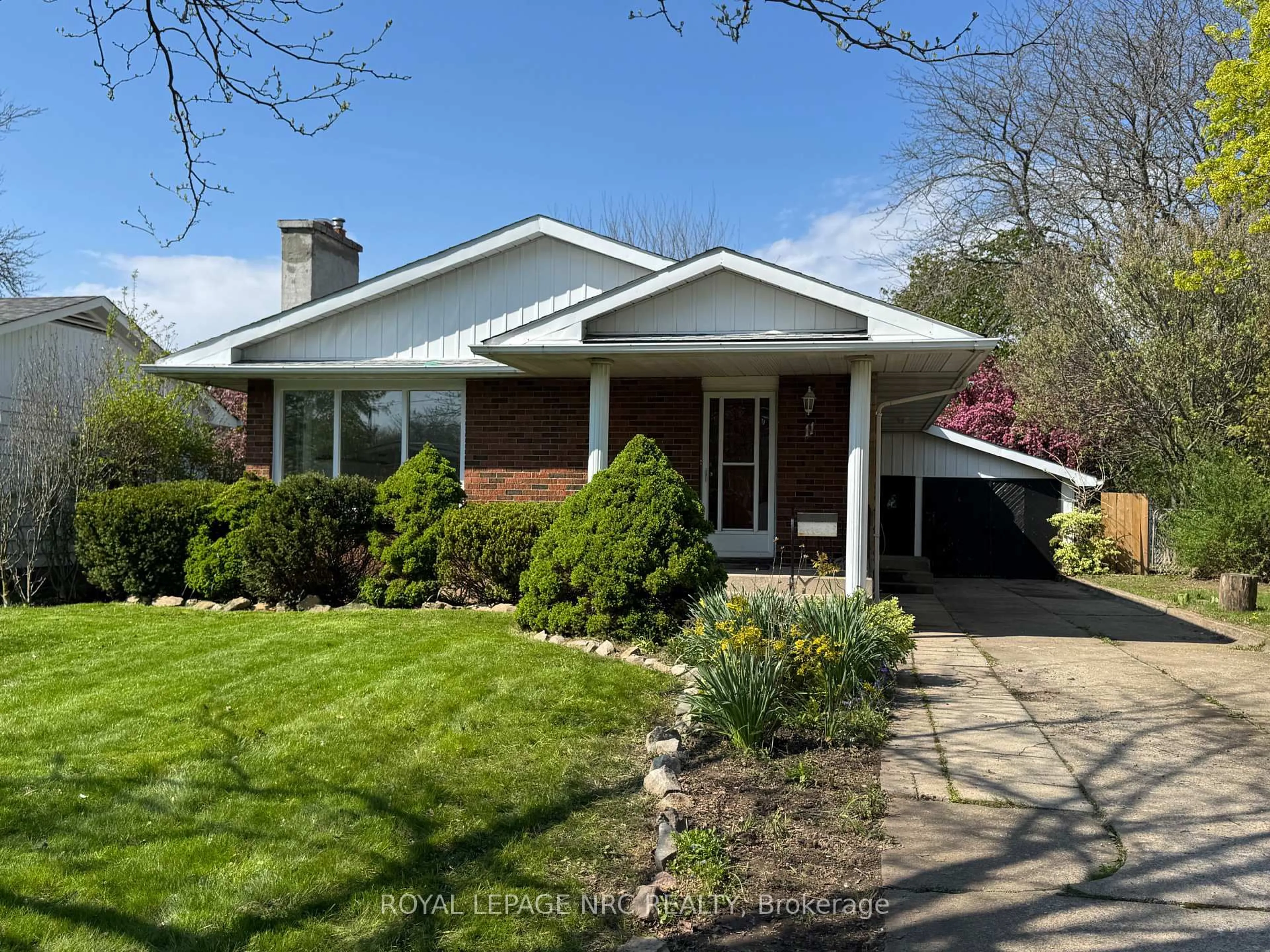 Home with brick exterior material, street for 11 Richard St, St. Catharines Ontario L2T 2E1
