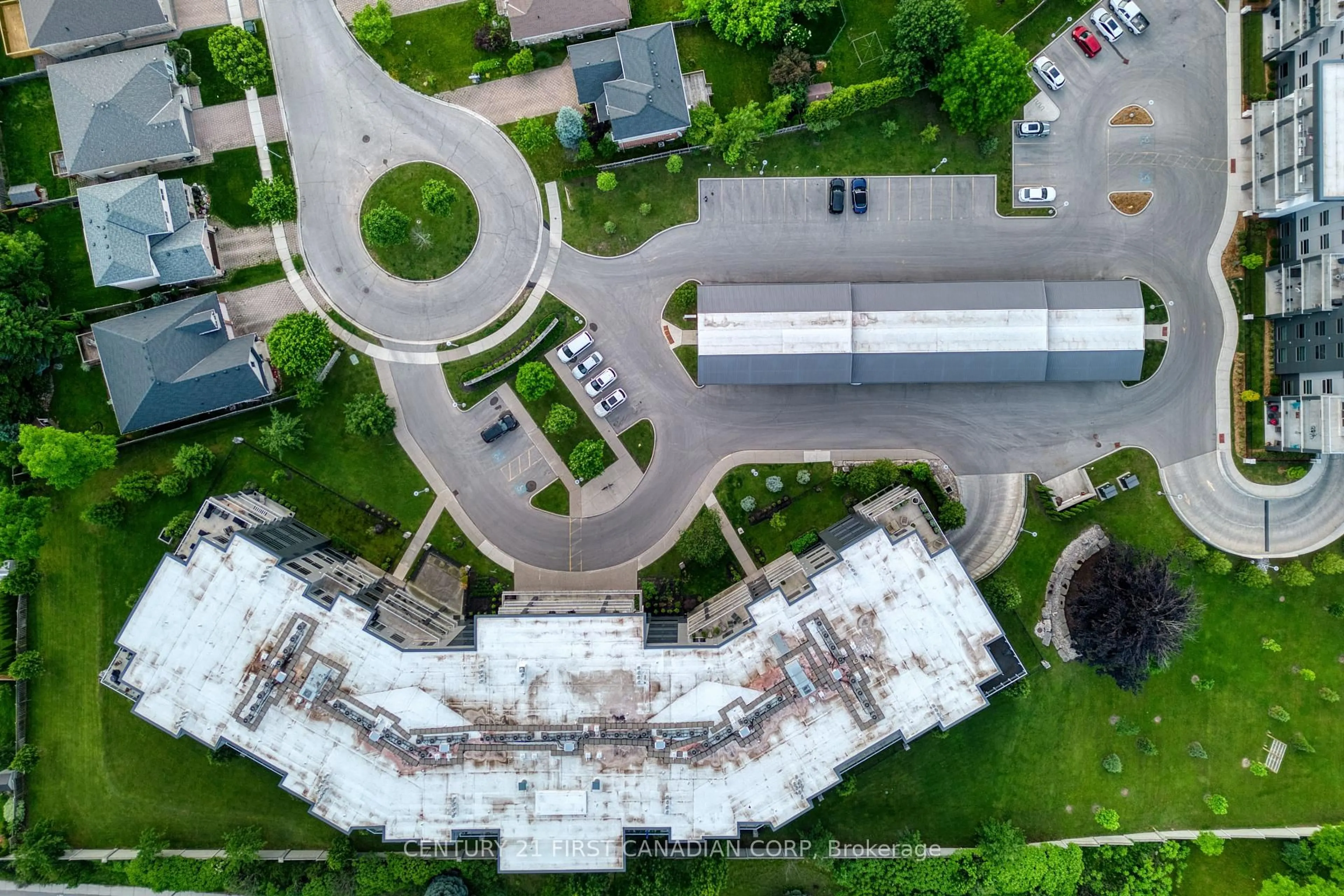 A pic from outside/outdoor area/front of a property/back of a property/a pic from drone, building for 1705 Fiddlehead Pl #105, London North Ontario N6G 0S1