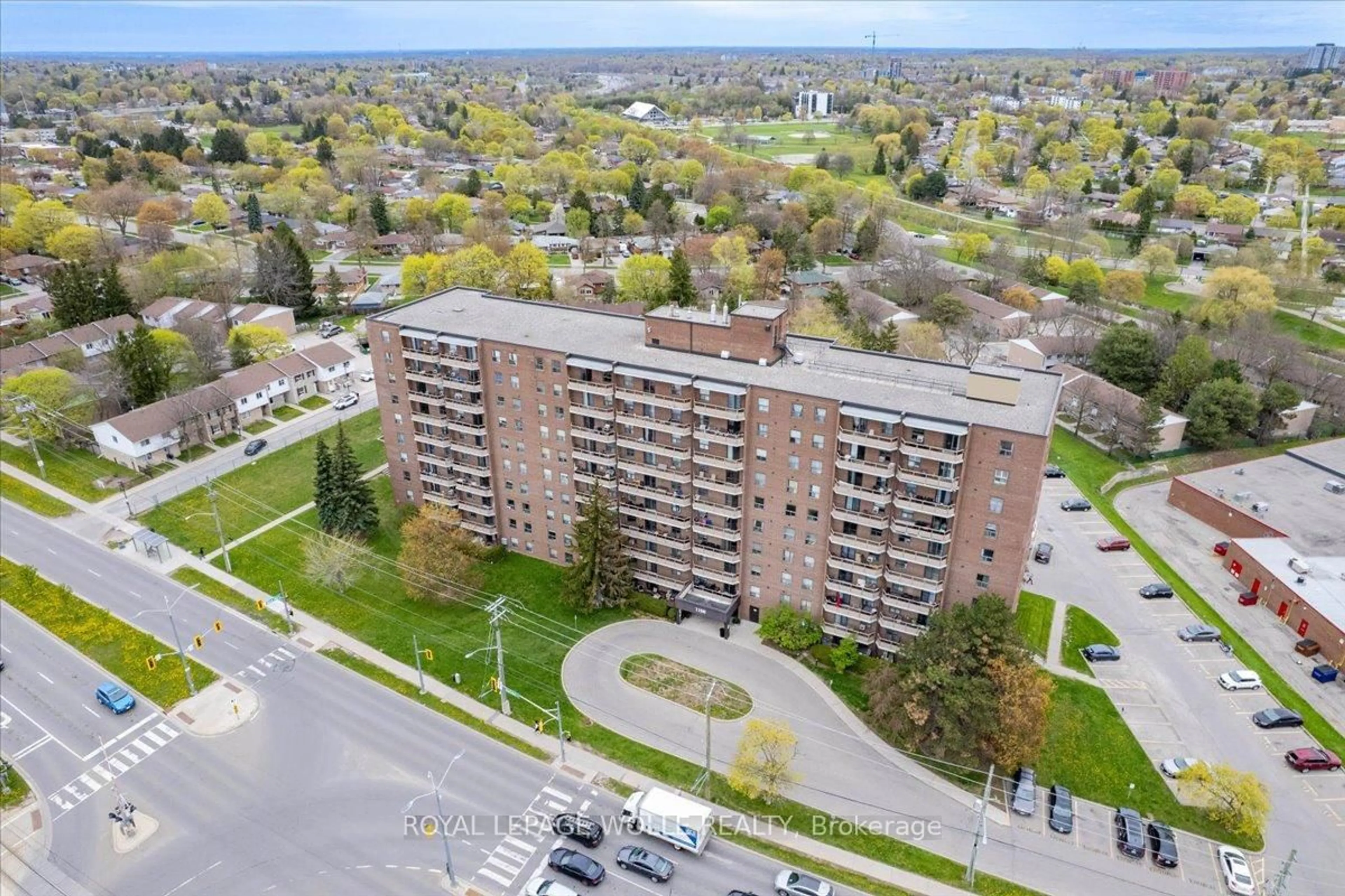 A pic from outside/outdoor area/front of a property/back of a property/a pic from drone, city buildings view from balcony for 1100 Courtland Ave #407, Kitchener Ontario N2C 2H9