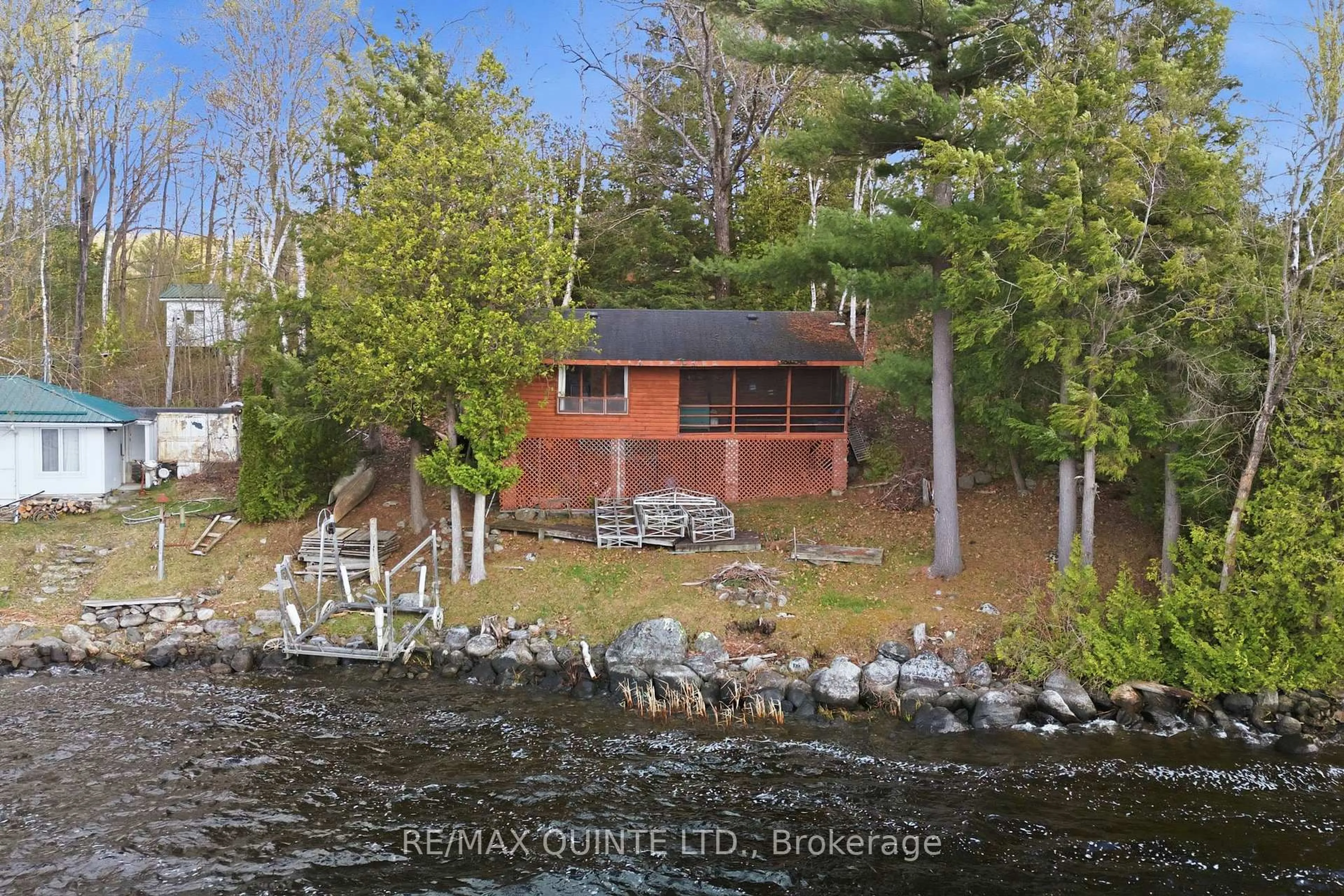 A pic from outside/outdoor area/front of a property/back of a property/a pic from drone, water/lake/river/ocean view for 165 Retriever Lane, Tweed Ontario K0K 3J0