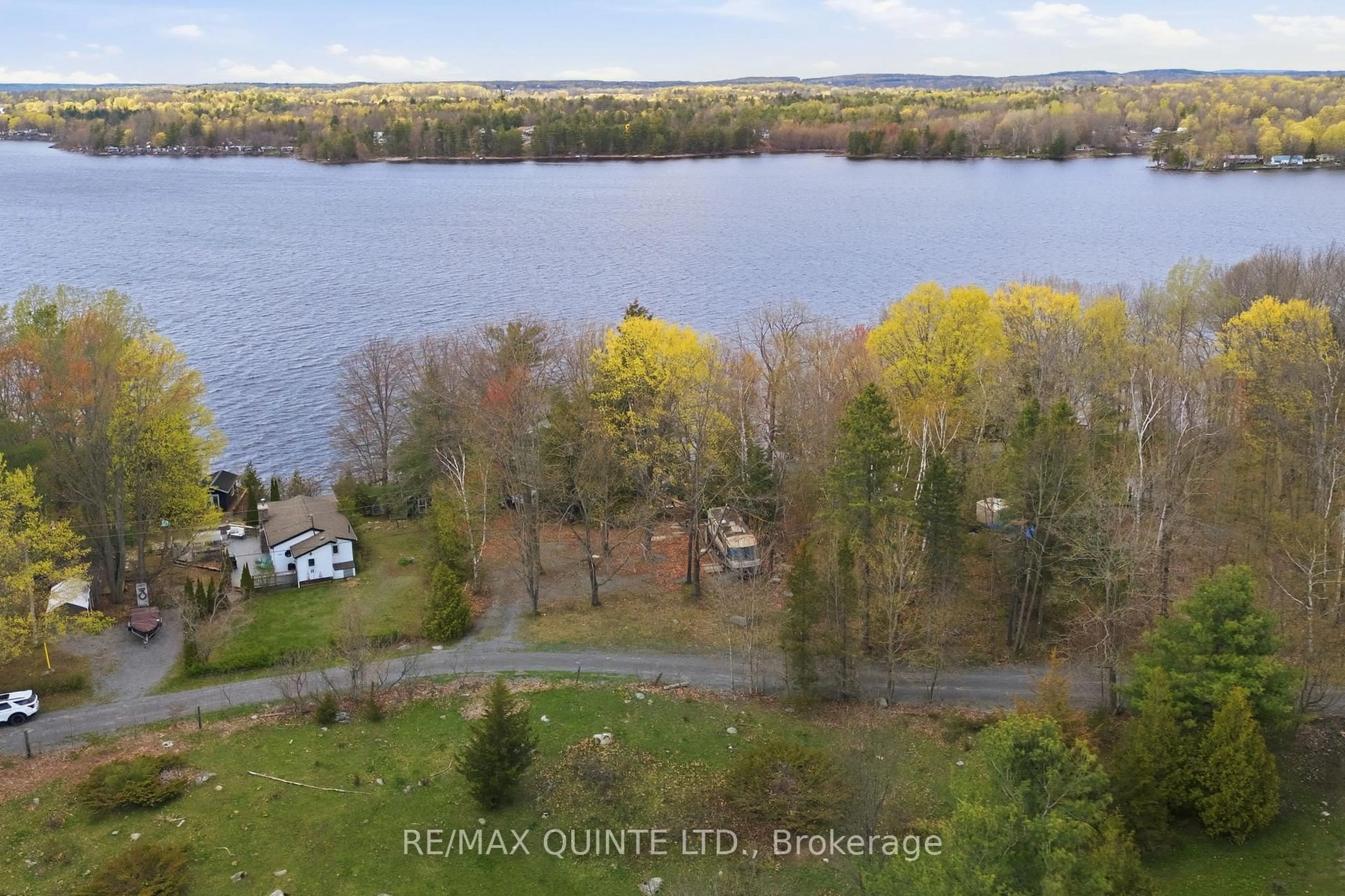 A pic from outside/outdoor area/front of a property/back of a property/a pic from drone, water/lake/river/ocean view for 165 Retriever Lane, Tweed Ontario K0K 3J0