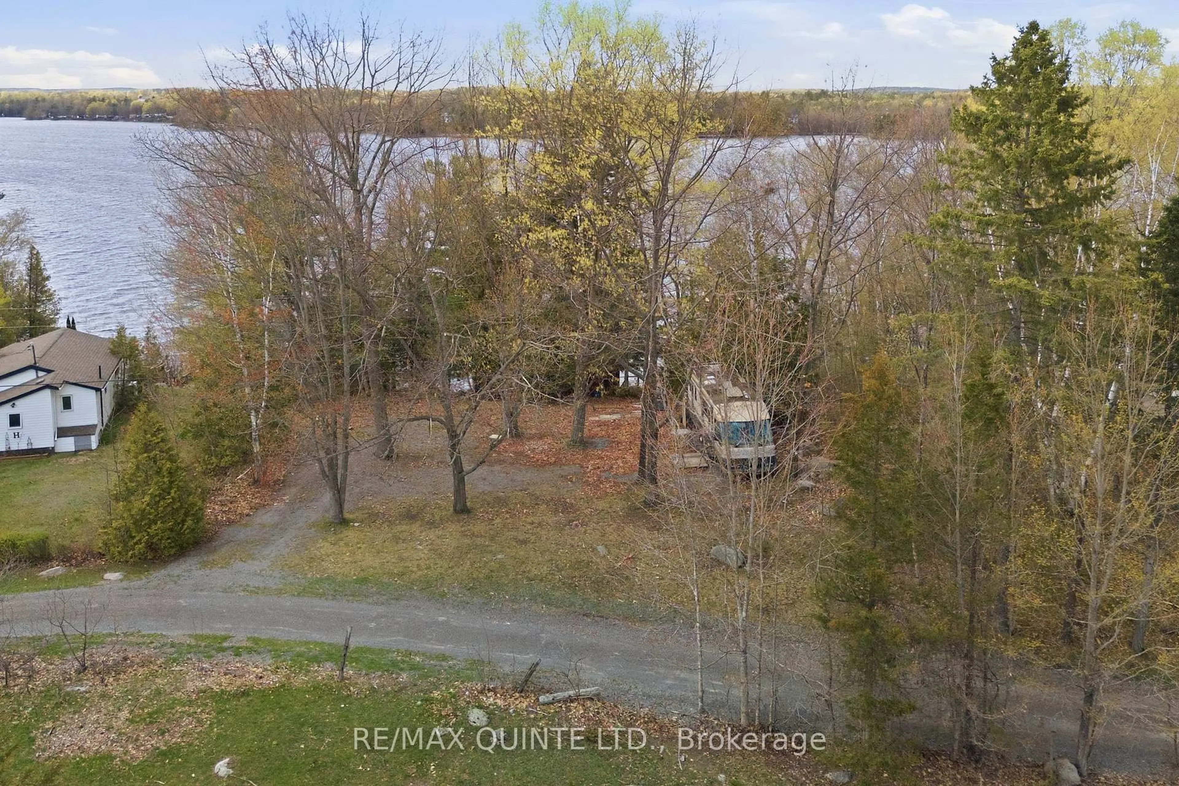 A pic from outside/outdoor area/front of a property/back of a property/a pic from drone, water/lake/river/ocean view for 165 Retriever Lane, Tweed Ontario K0K 3J0