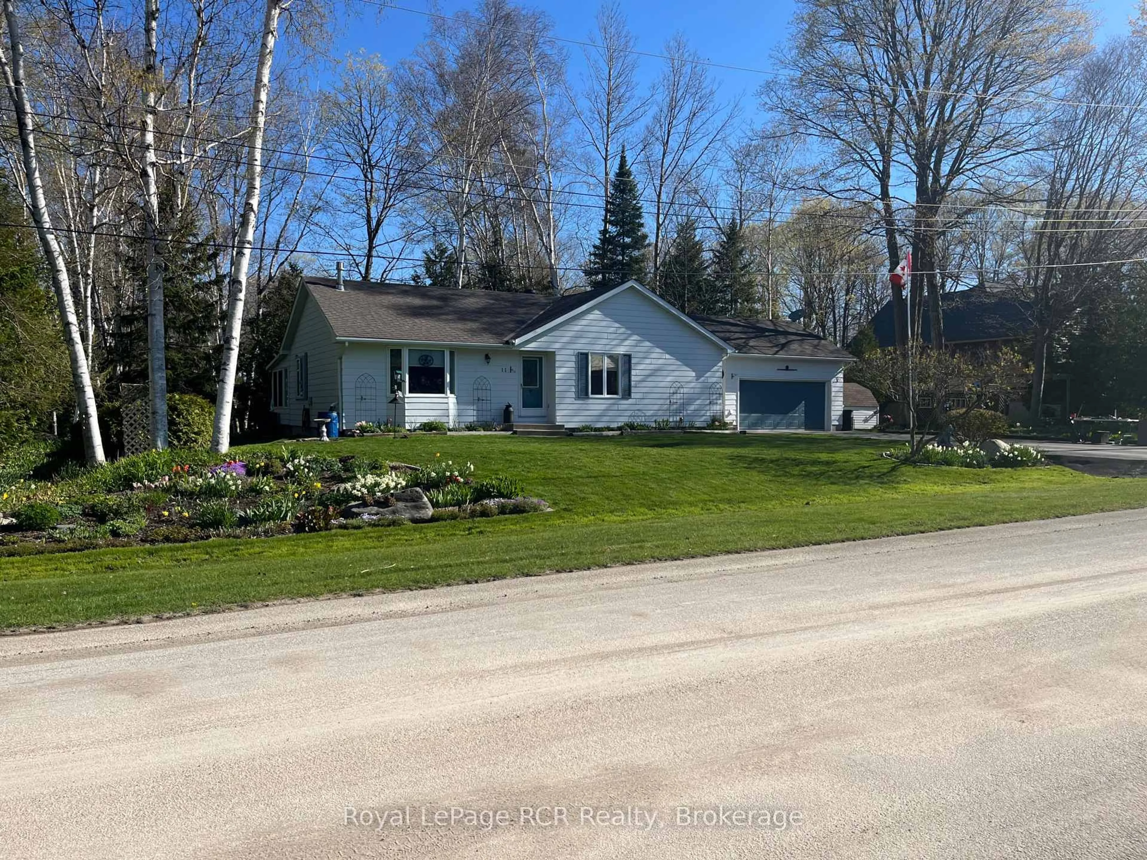 A pic from outside/outdoor area/front of a property/back of a property/a pic from drone, street for 11 Graham Cres, South Bruce Peninsula Ontario N0H 2G0