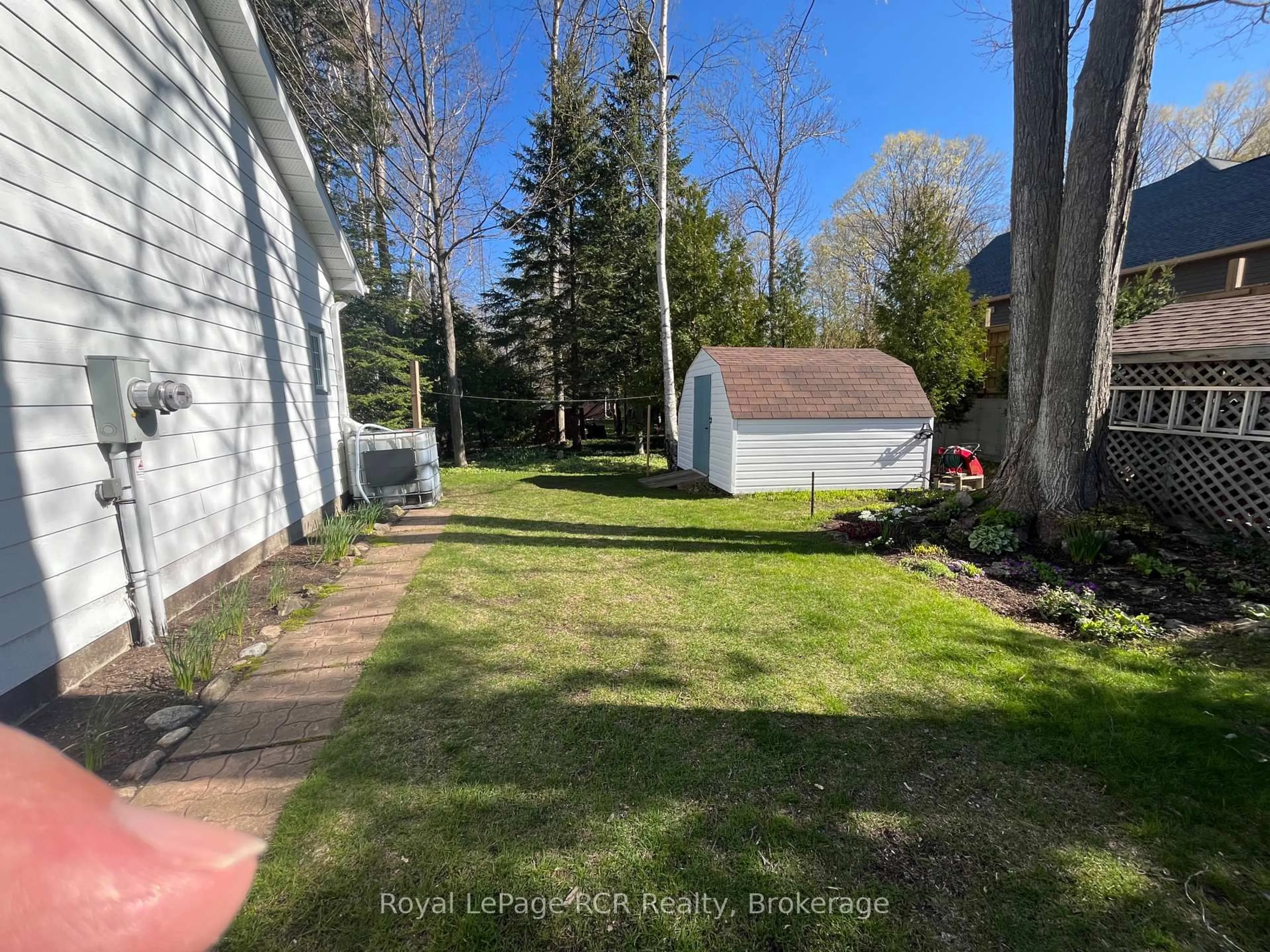 A pic from outside/outdoor area/front of a property/back of a property/a pic from drone, unknown for 11 Graham Cres, South Bruce Peninsula Ontario N0H 2G0
