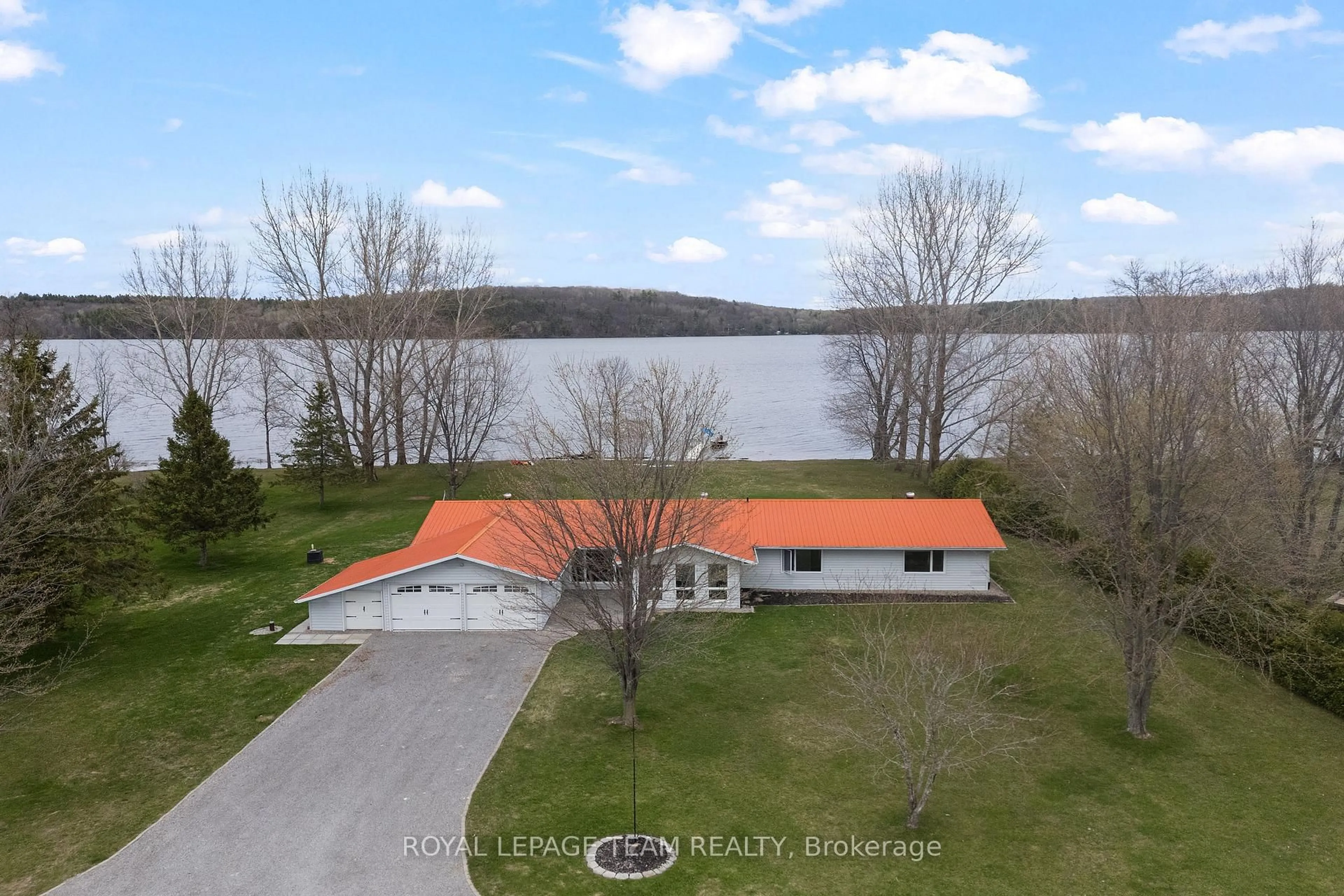 A pic from outside/outdoor area/front of a property/back of a property/a pic from drone, water/lake/river/ocean view for 34 Bird Lake Tr, Cobden Ontario K0J 1K0