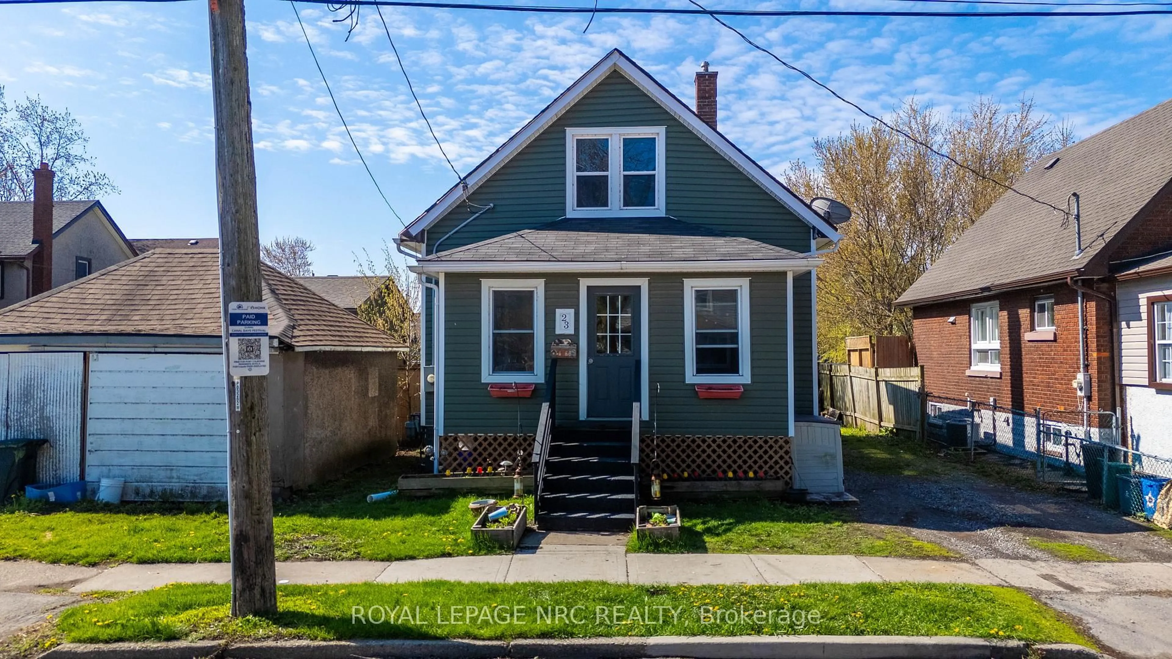 Home with vinyl exterior material, street for 23 Louis St, Port Colborne Ontario L3K 1C2